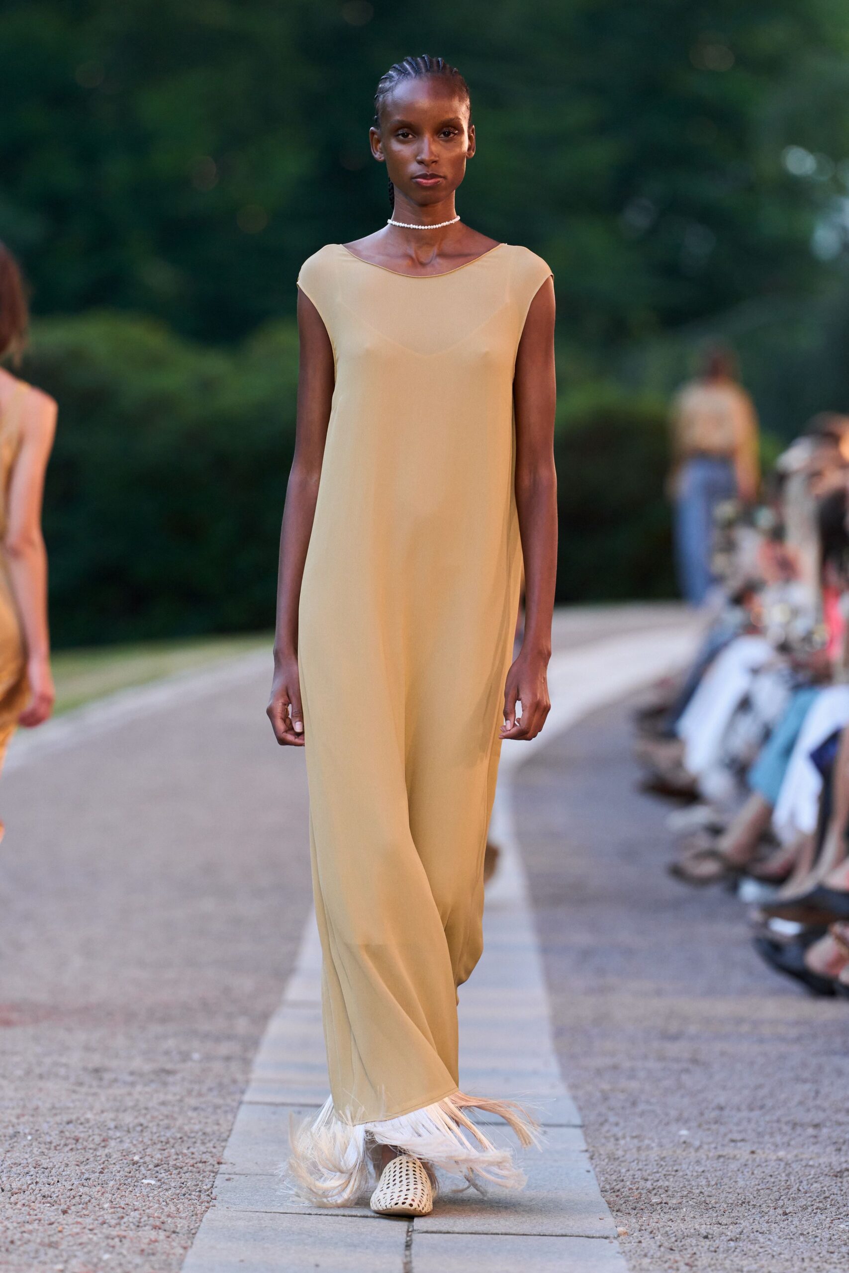 beige silk sleeveless high-neck relaxed flowing maxi gown