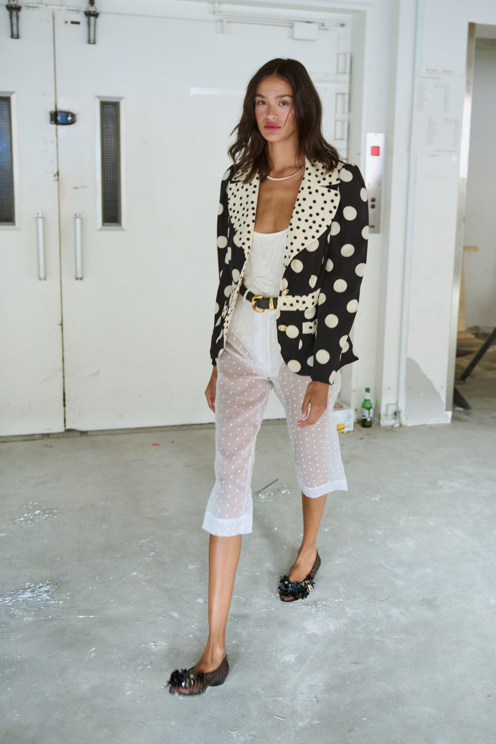 black long-sleeve collared structured polka-dot blazer