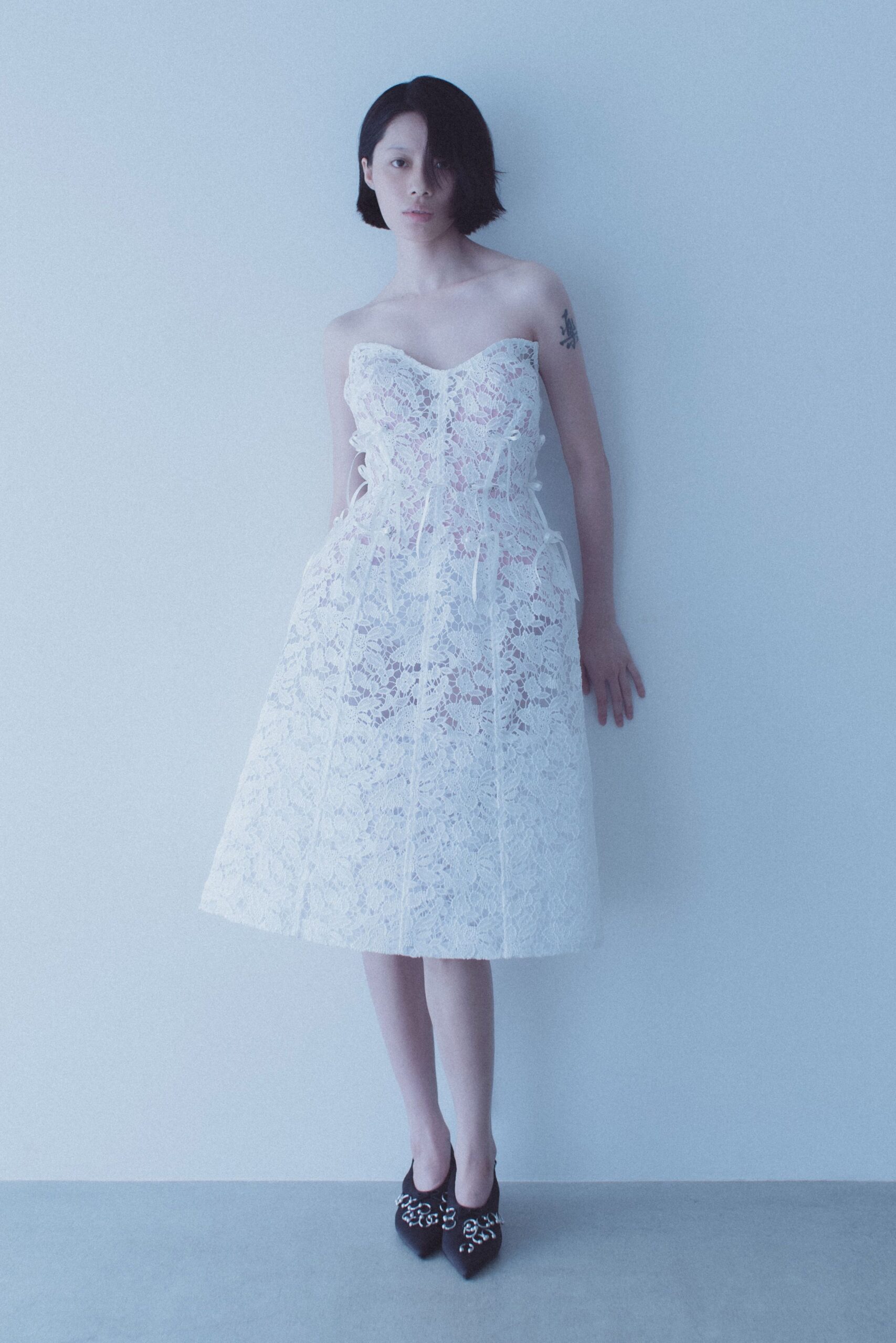 white lace midi dress with black shoes
