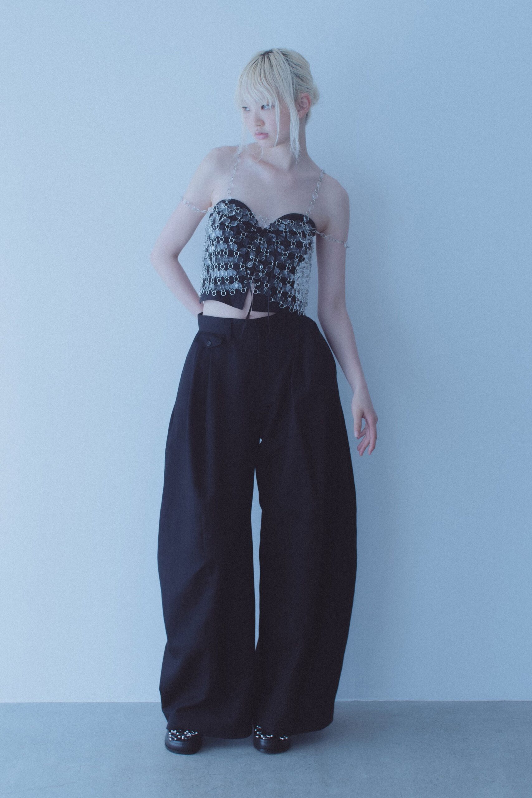 black and white embroidered top with wide-leg pants