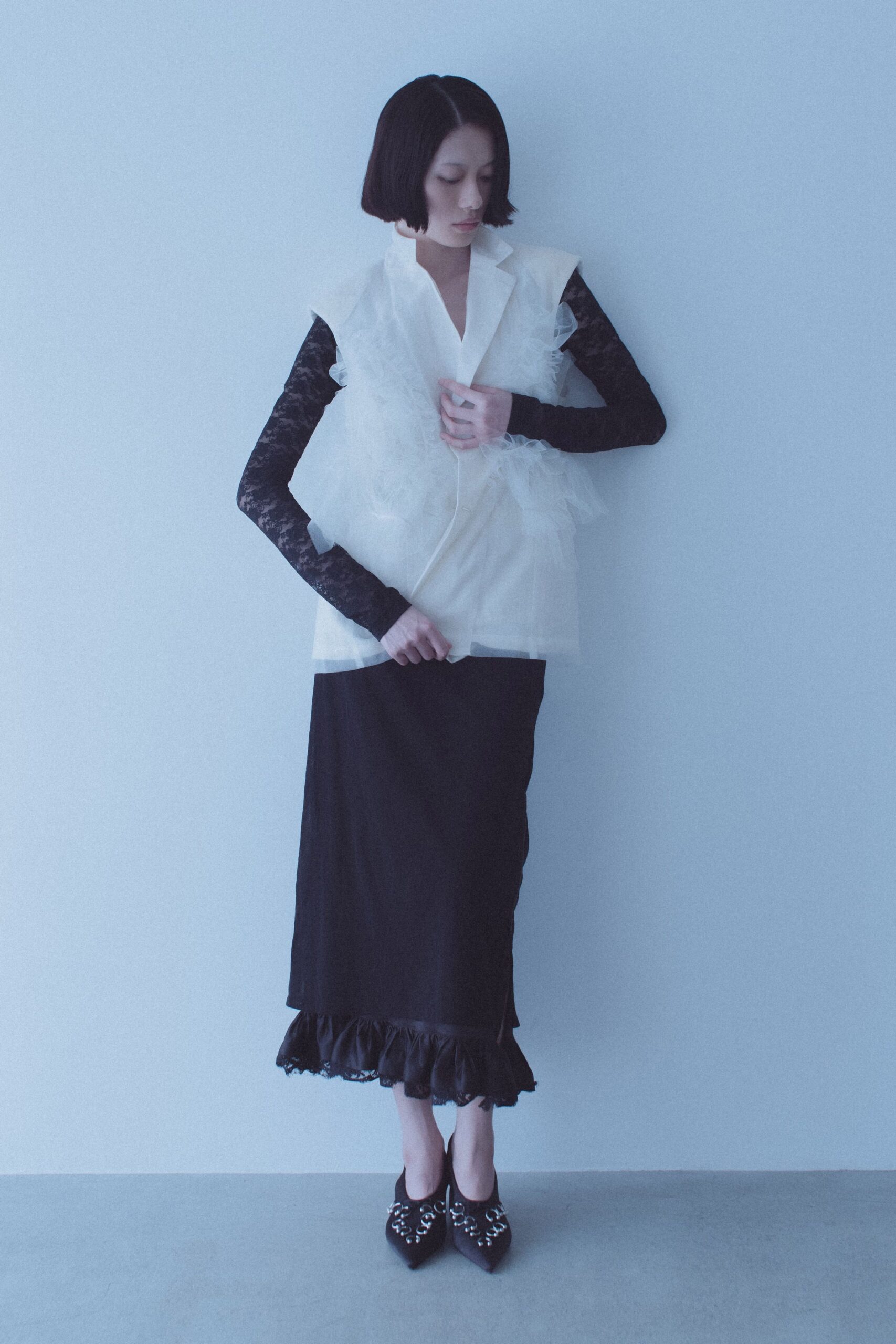 white silk blouse black midi skirt