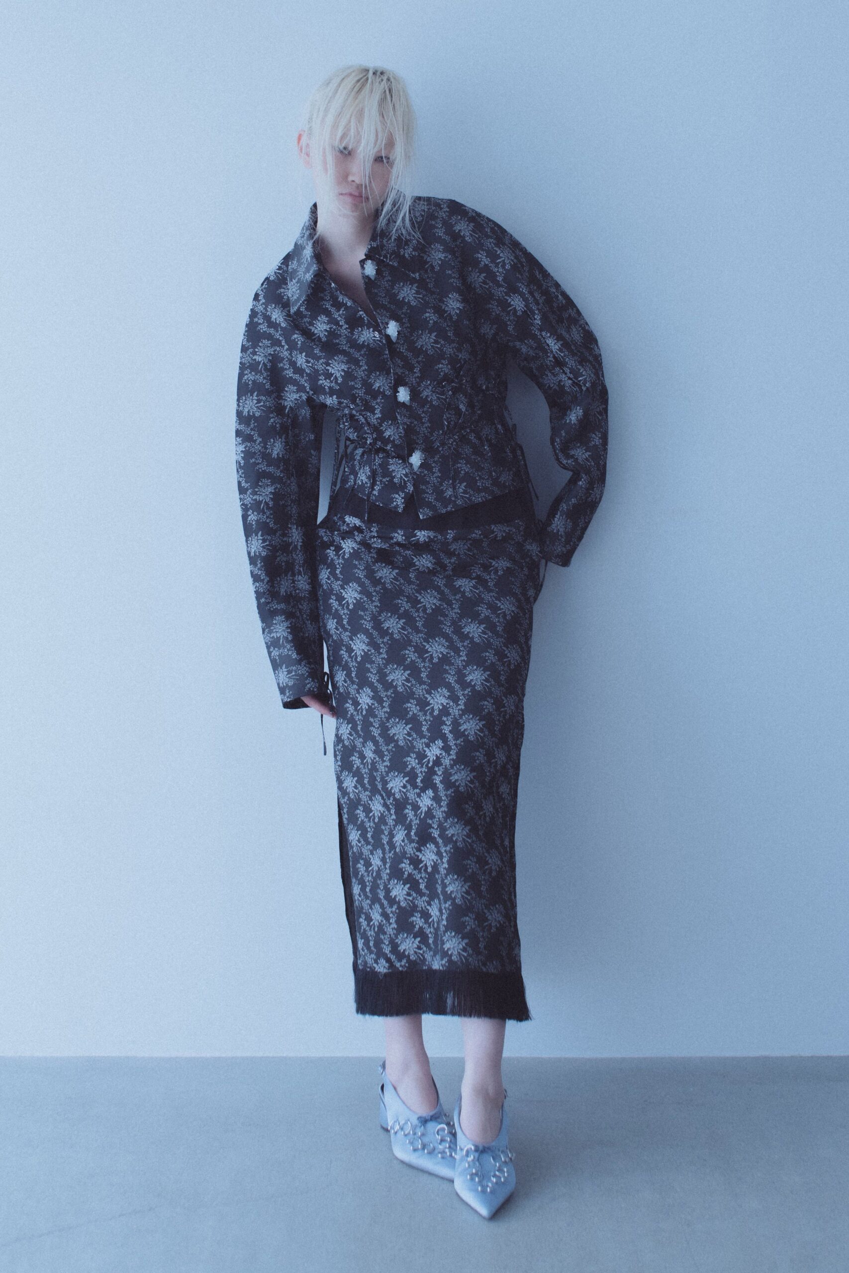 black and white printed jacket and skirt