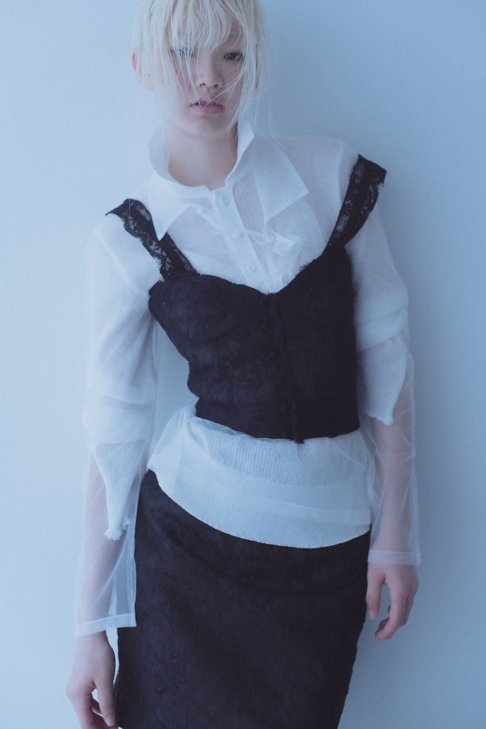 white collared top and black lace dress
