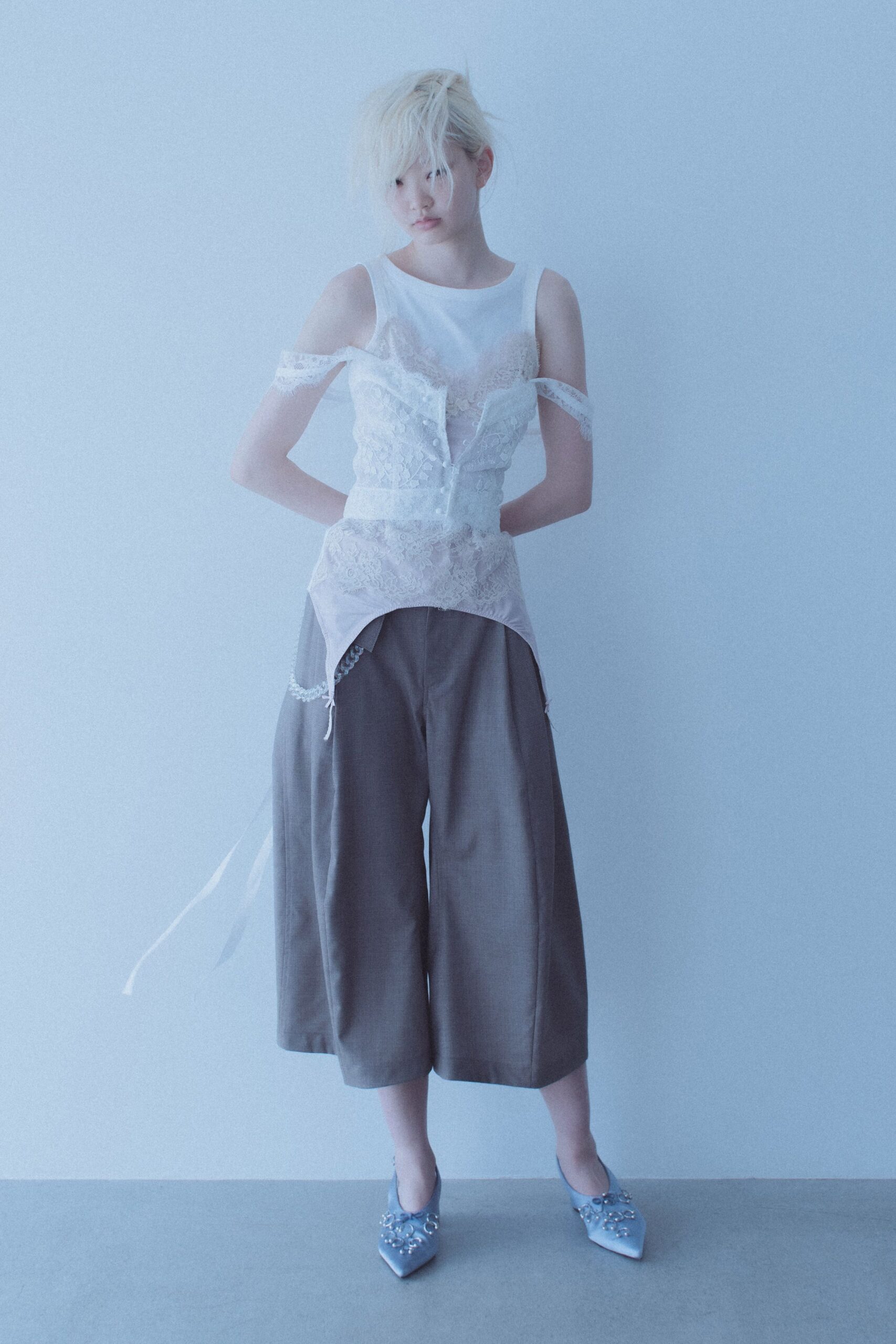 white lace top gray pants blue shoes