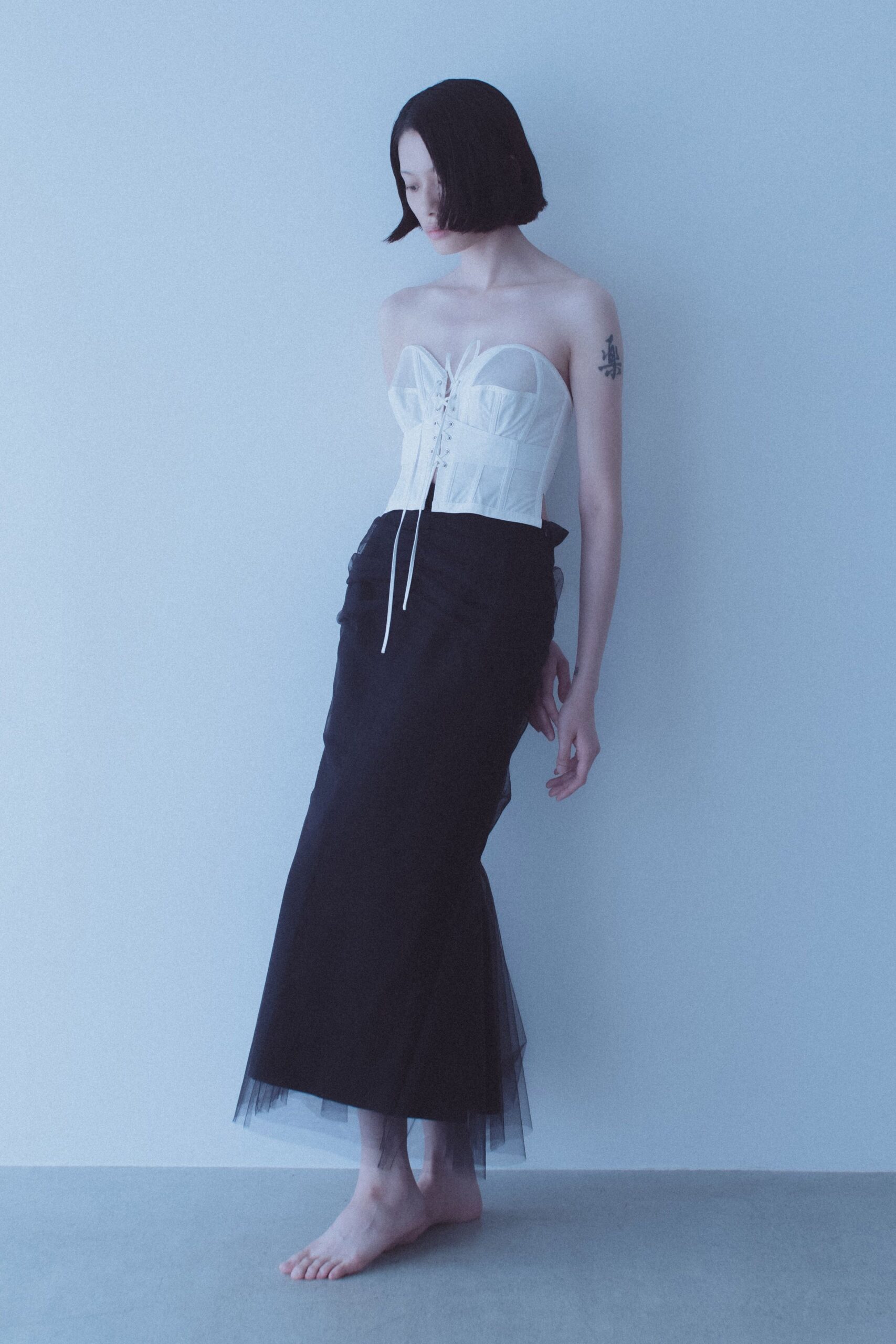 white corset black tiered skirt