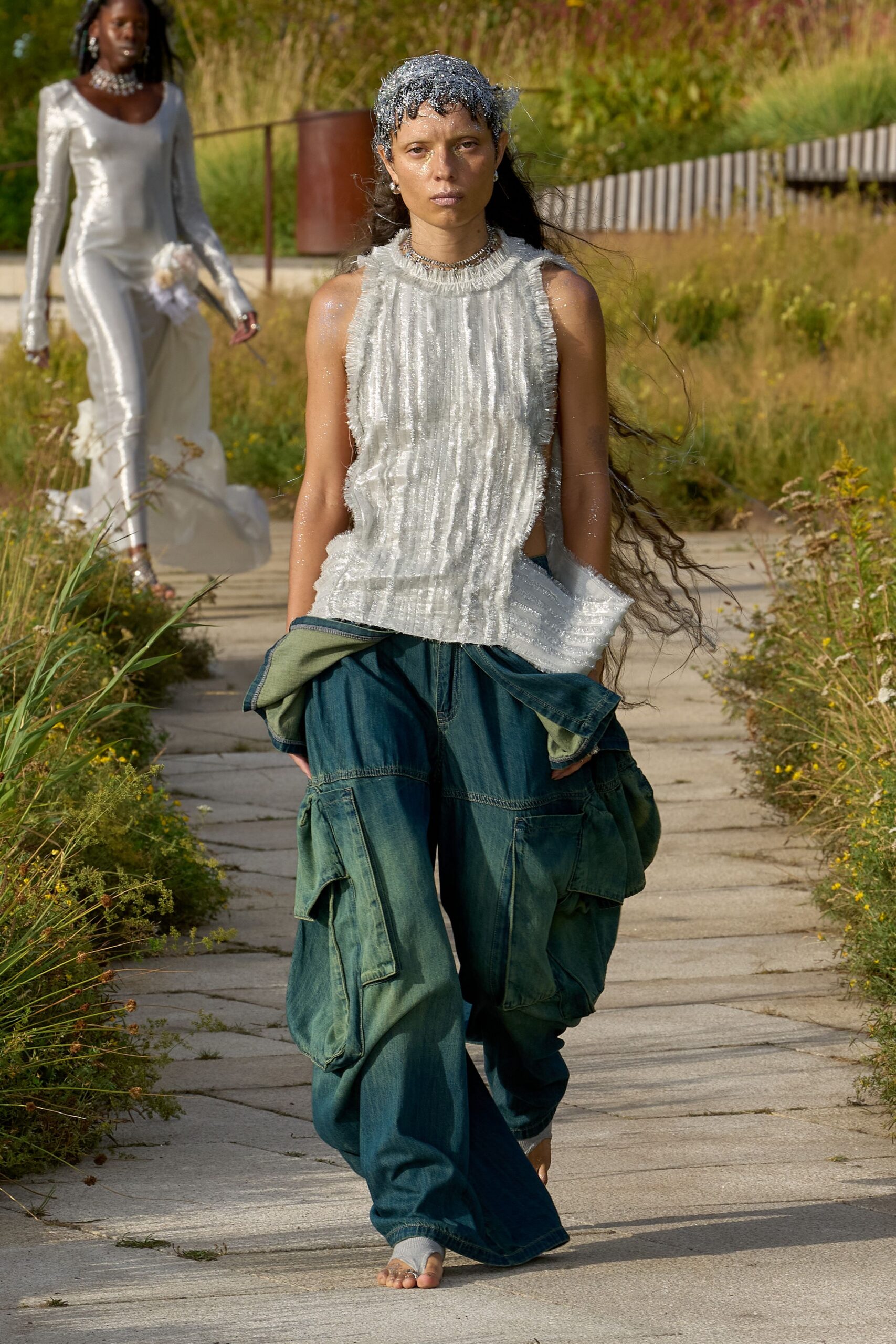 white silk sleeveless high-neck fitted pleated top