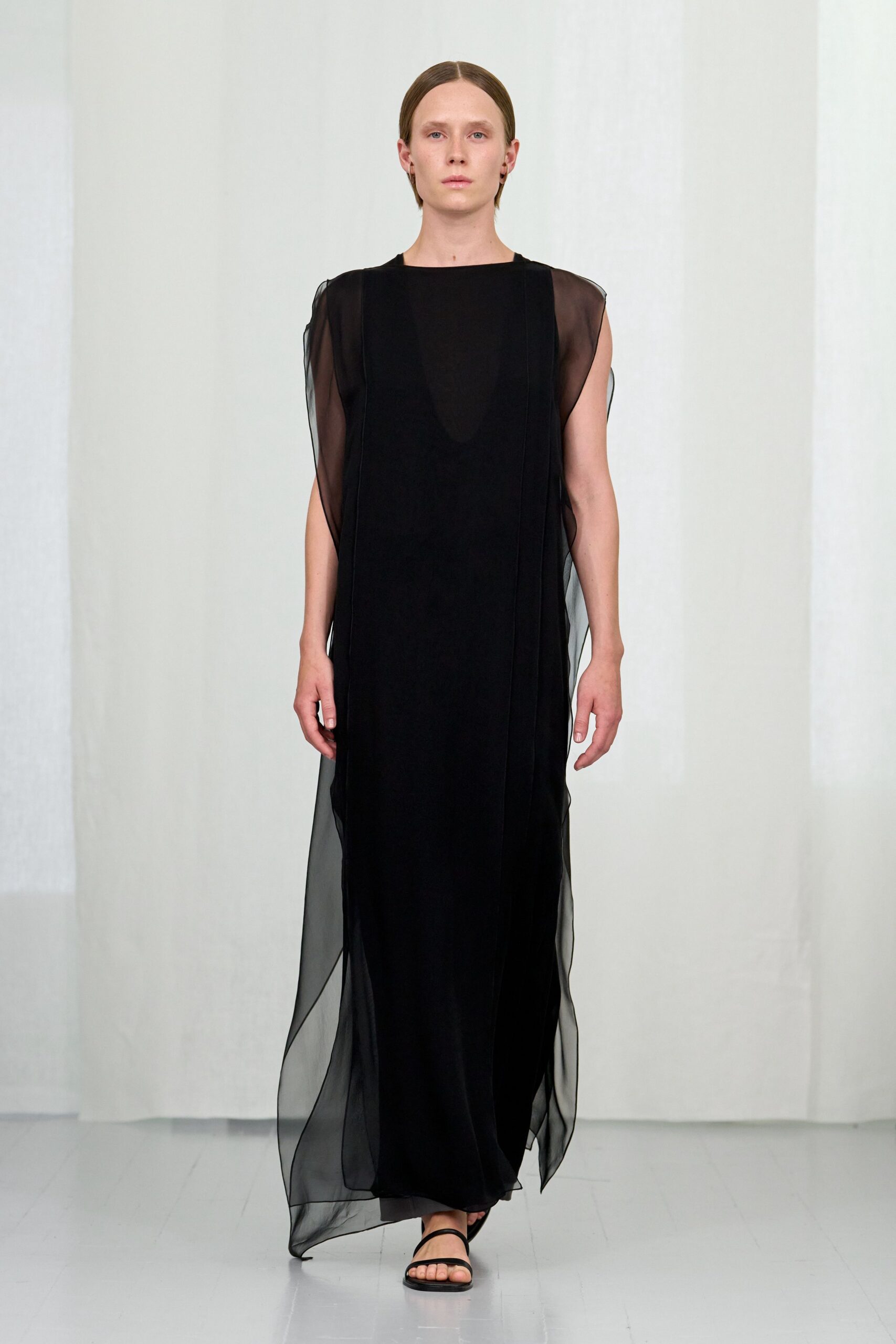 black silk sleeveless v-neck fitted layered flowing gown