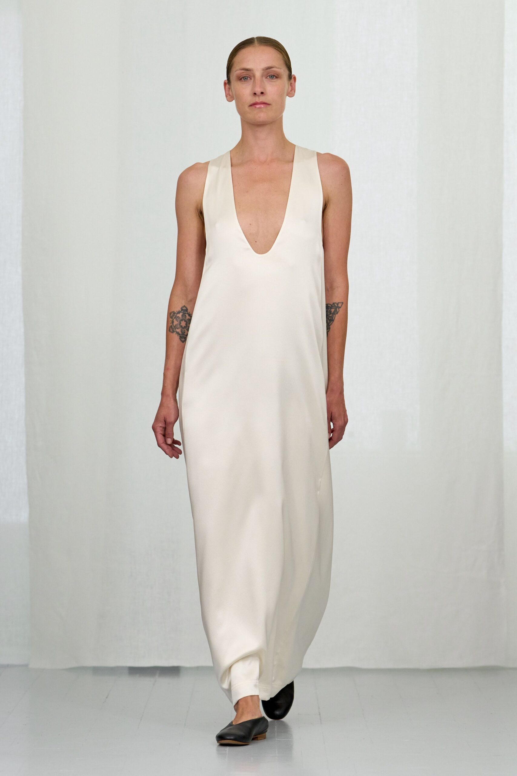 ivory silk sleeveless v-neck fitted shiny maxi gown
