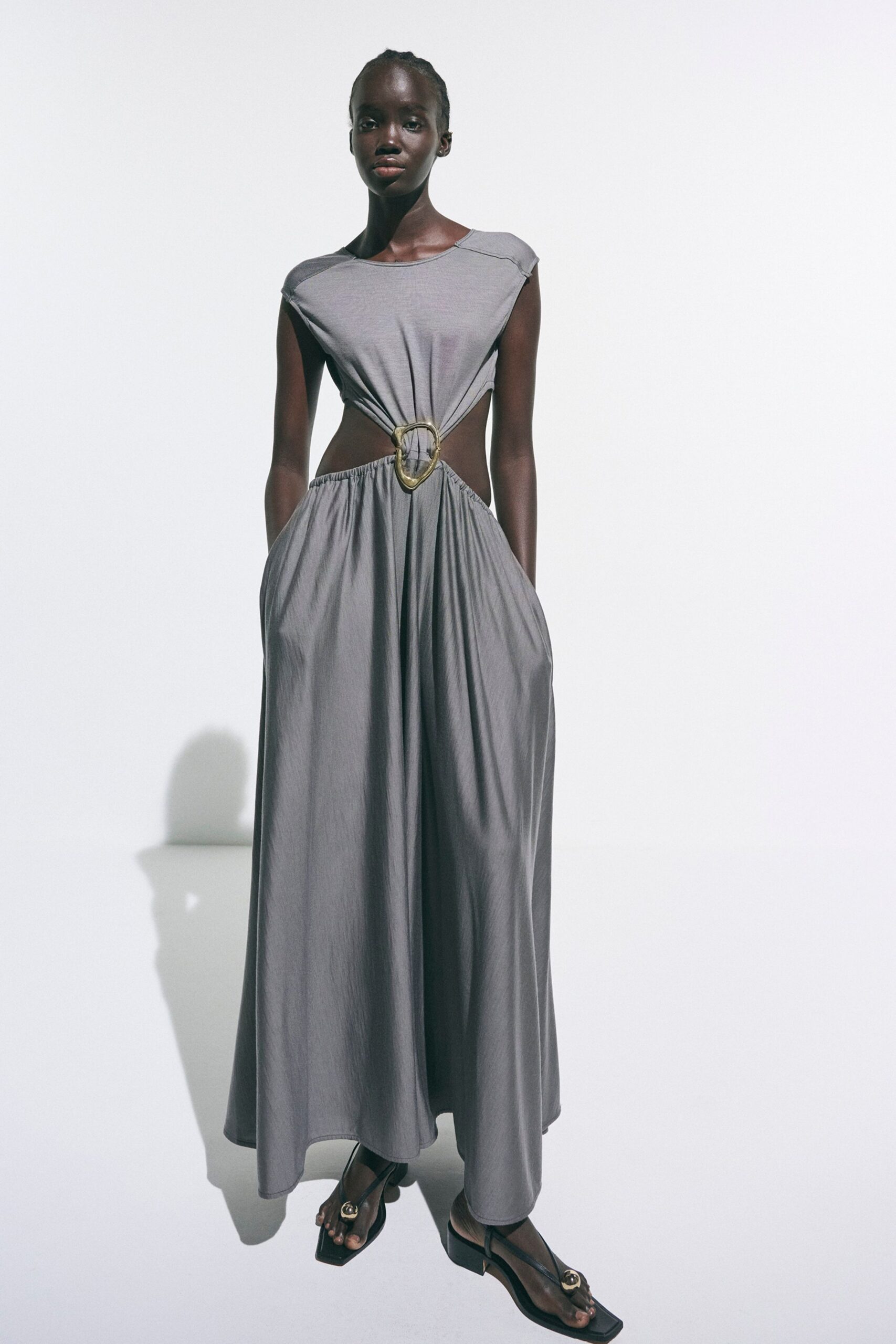 gray cotton sleeveless cutout relaxed pleated pockets dress