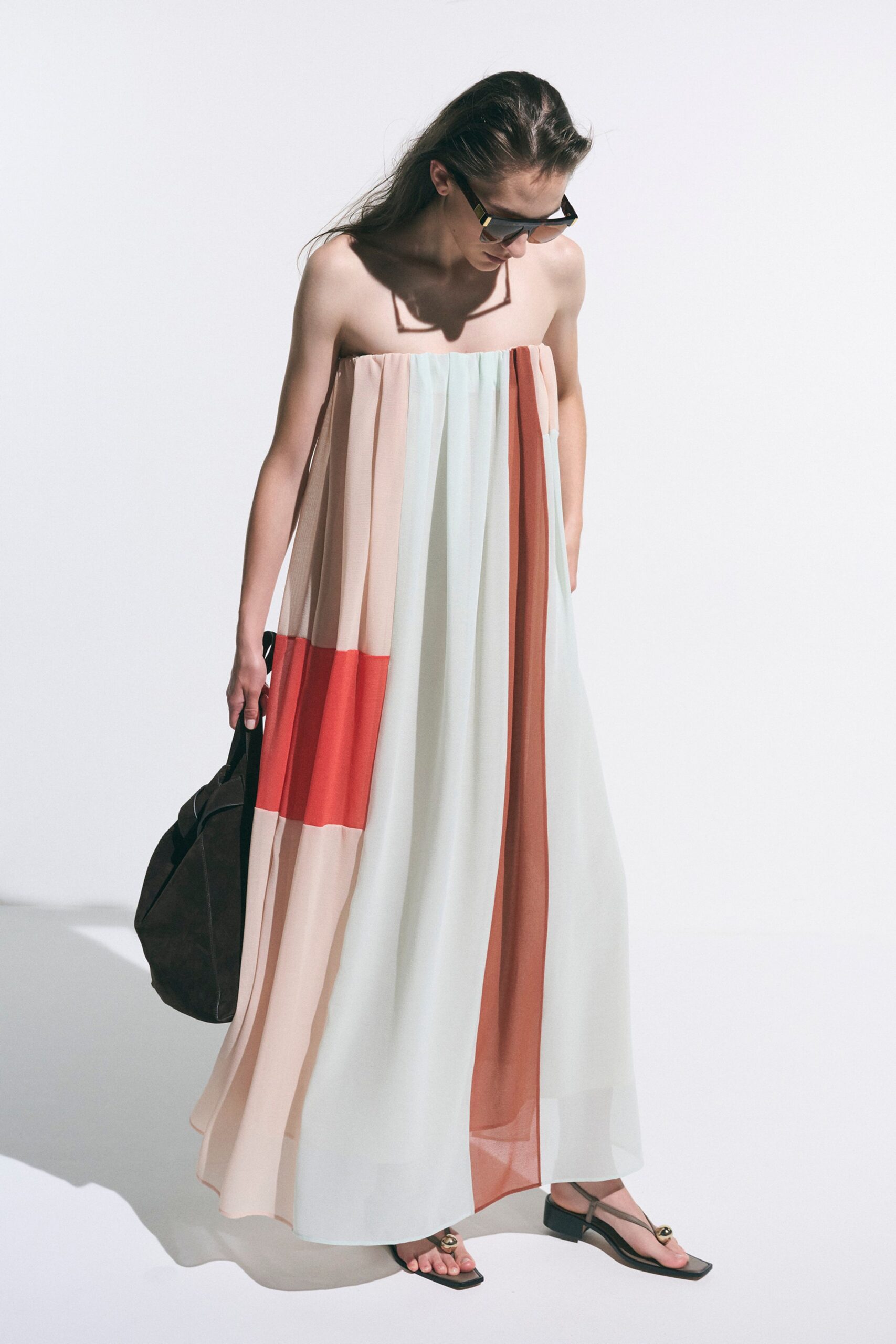 multi chiffon strapless pleated color-blocked sheer flowing maxi-dress