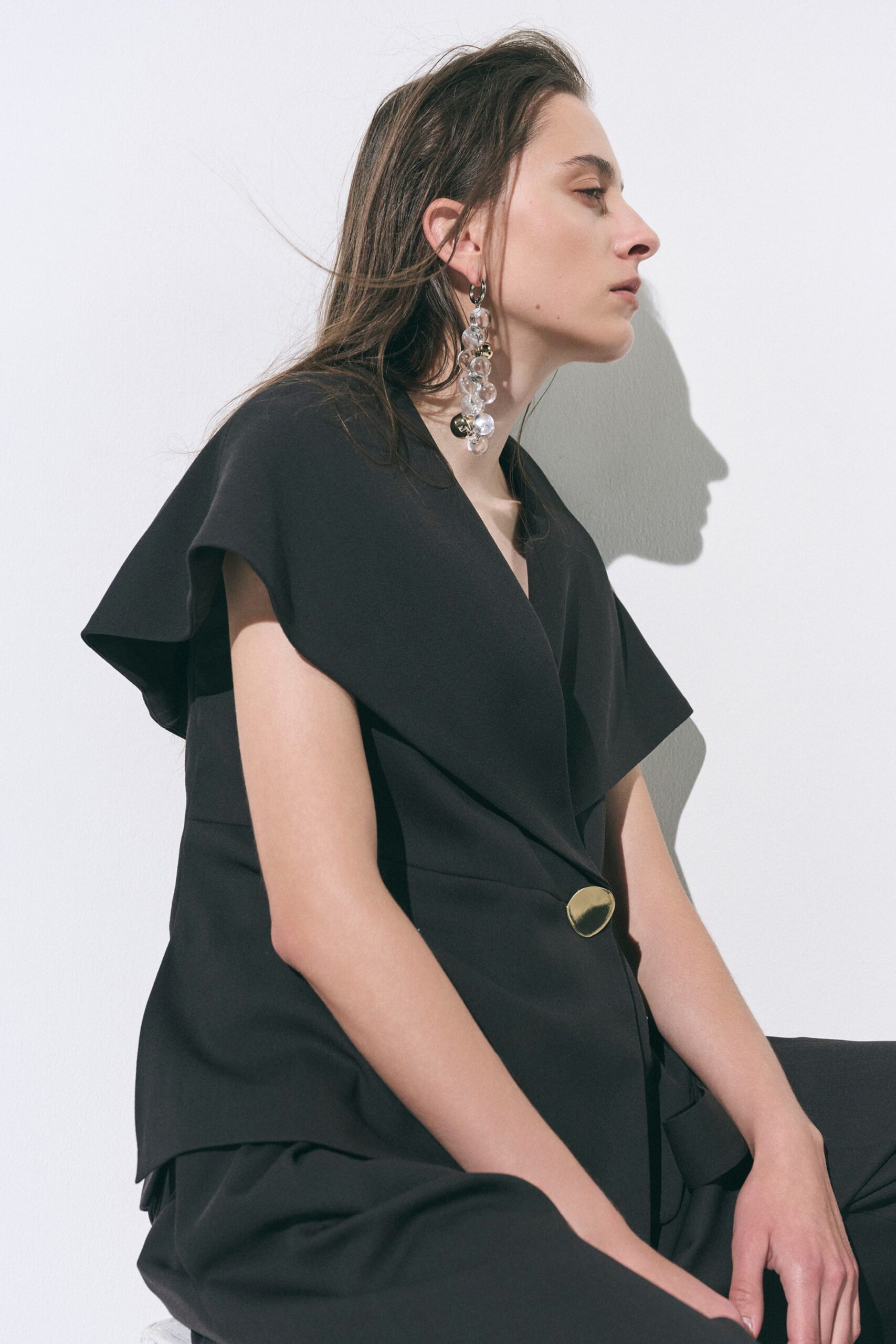 black cotton short-sleeve collared structured buttoned blazer