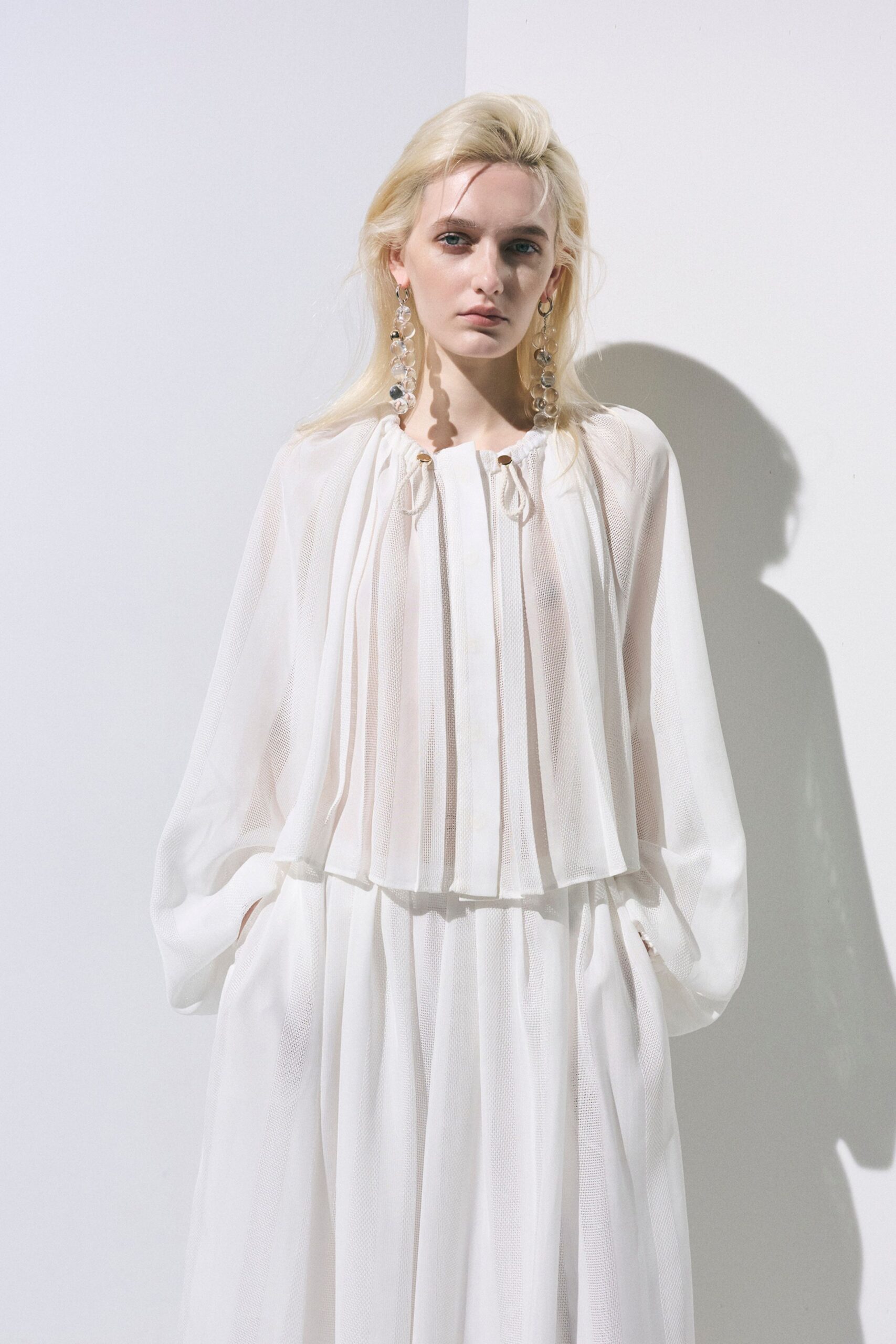 white chiffon long-sleeve collared relaxed pleated sheer blouse