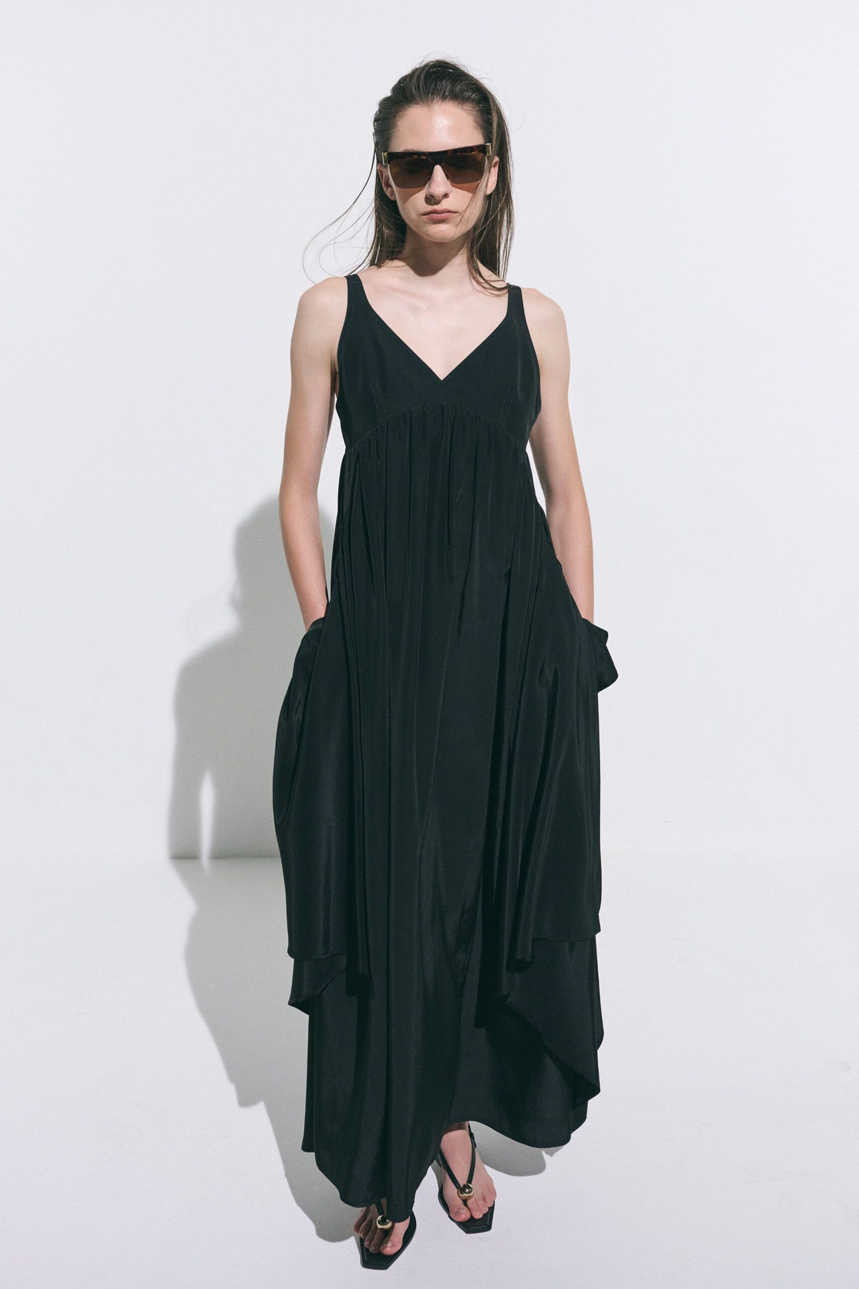 black silk sleeveless v-neck fitted draped tiered dress