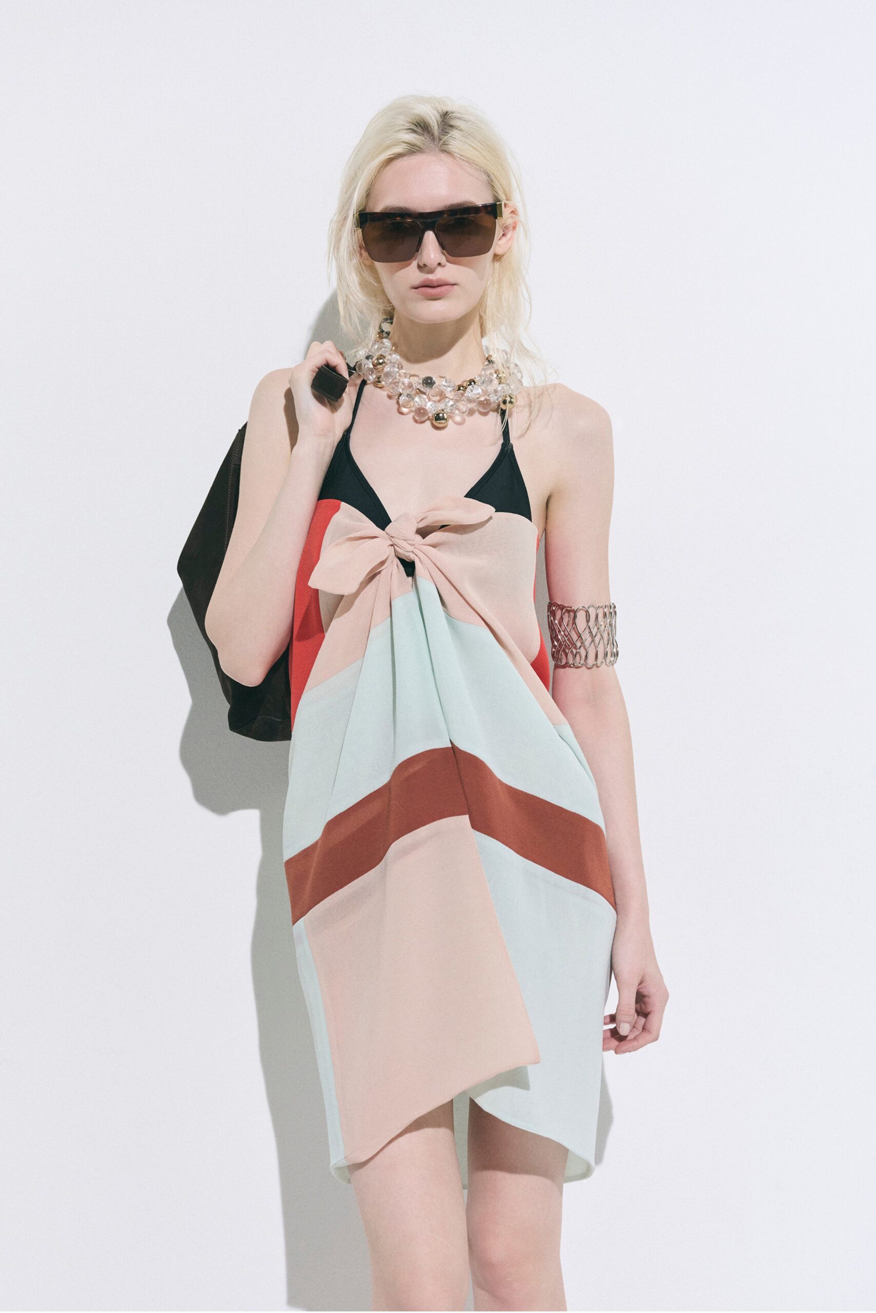 black silk sleeveless halter fitted draped color-blocked dress