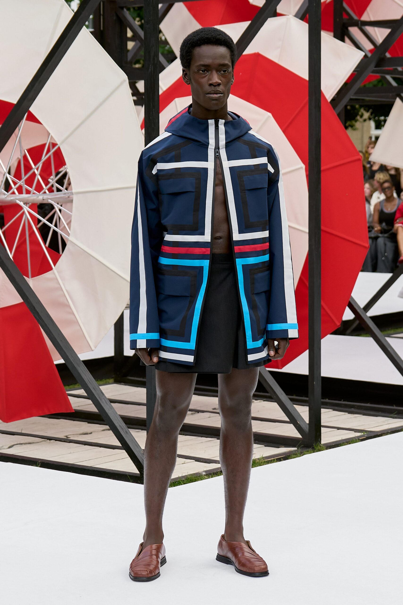 blue color-blocked jacket with black skirt