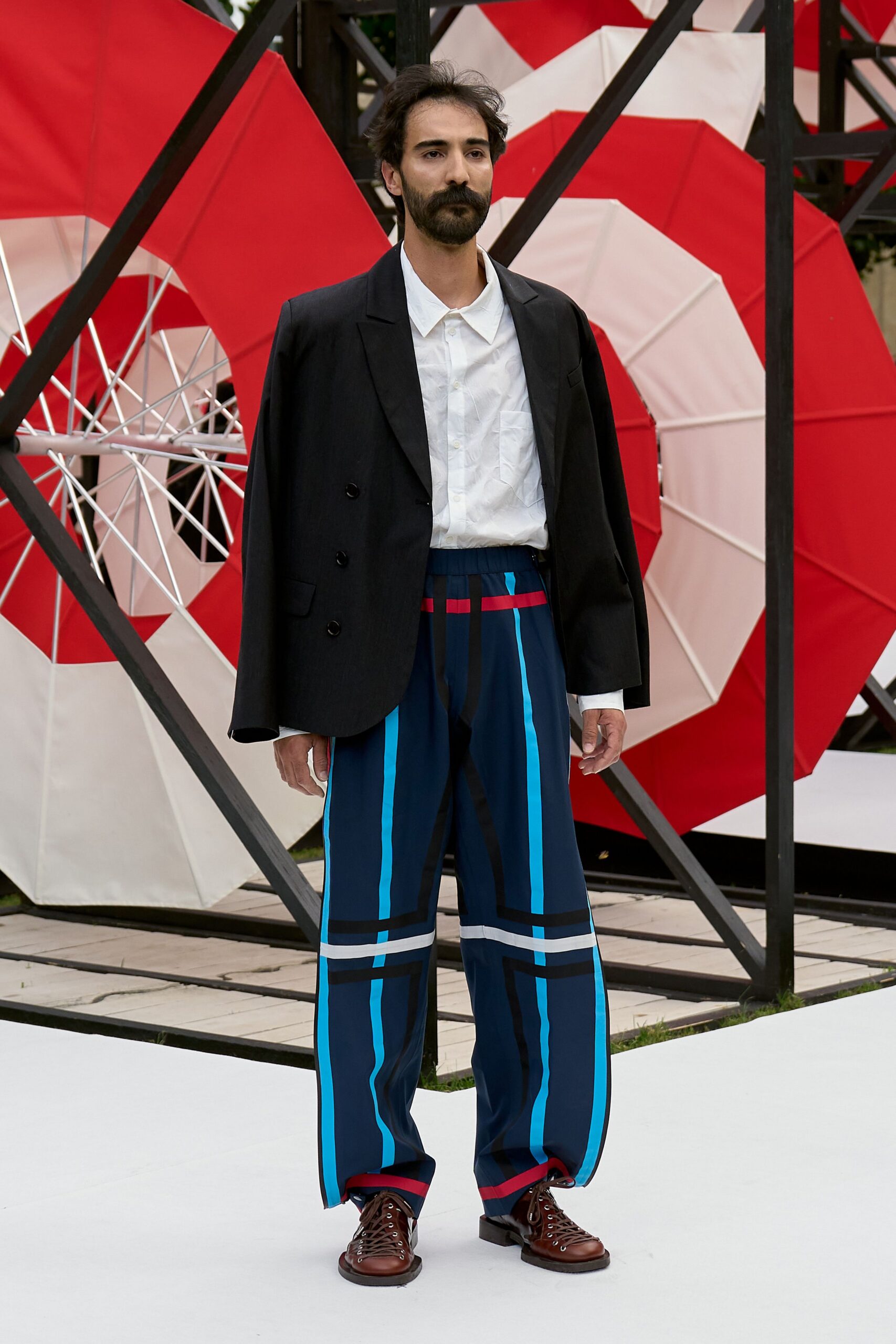 black blazer white shirt blue striped pants