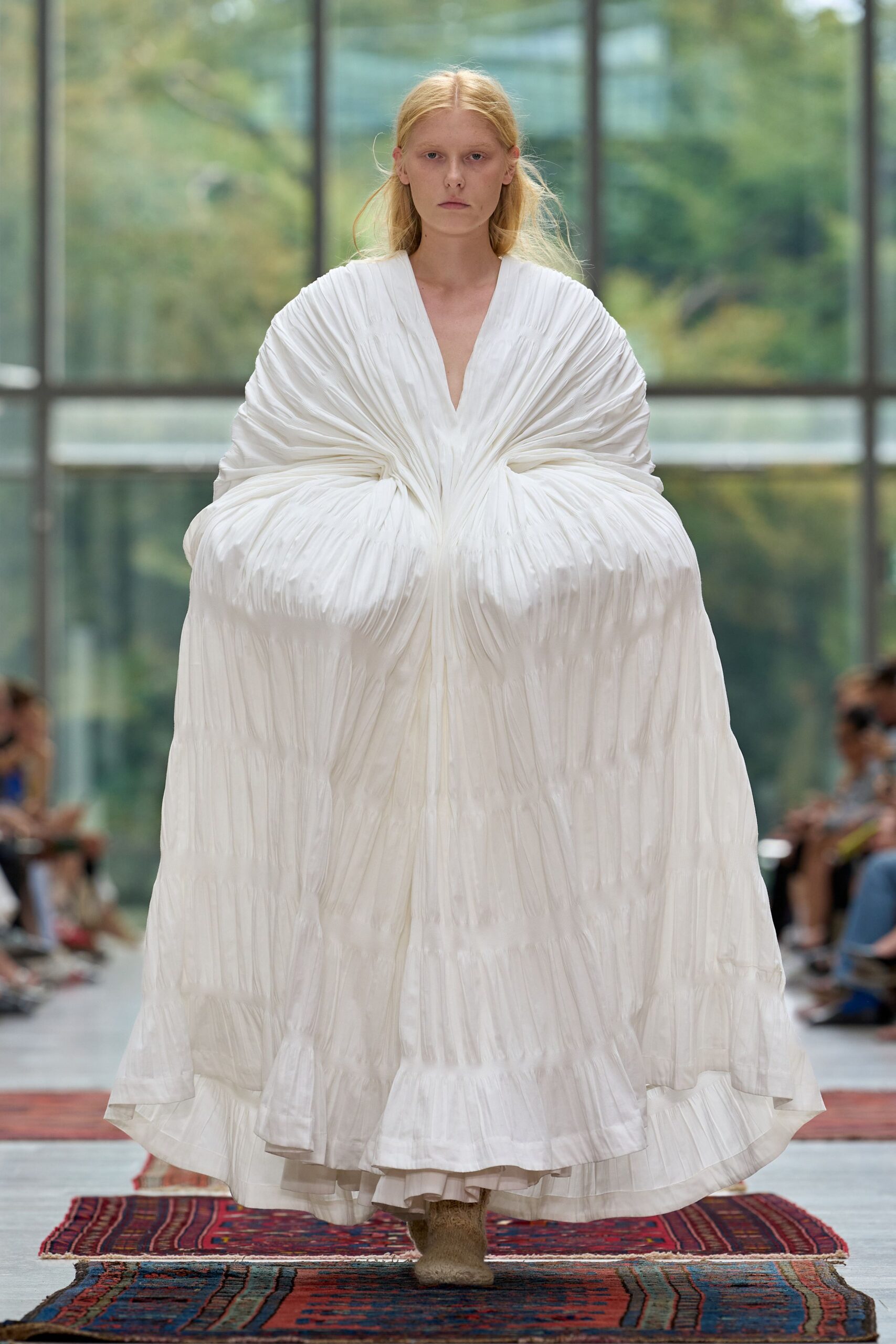 white cotton long-sleeve v-neck relaxed pleated flowing gown