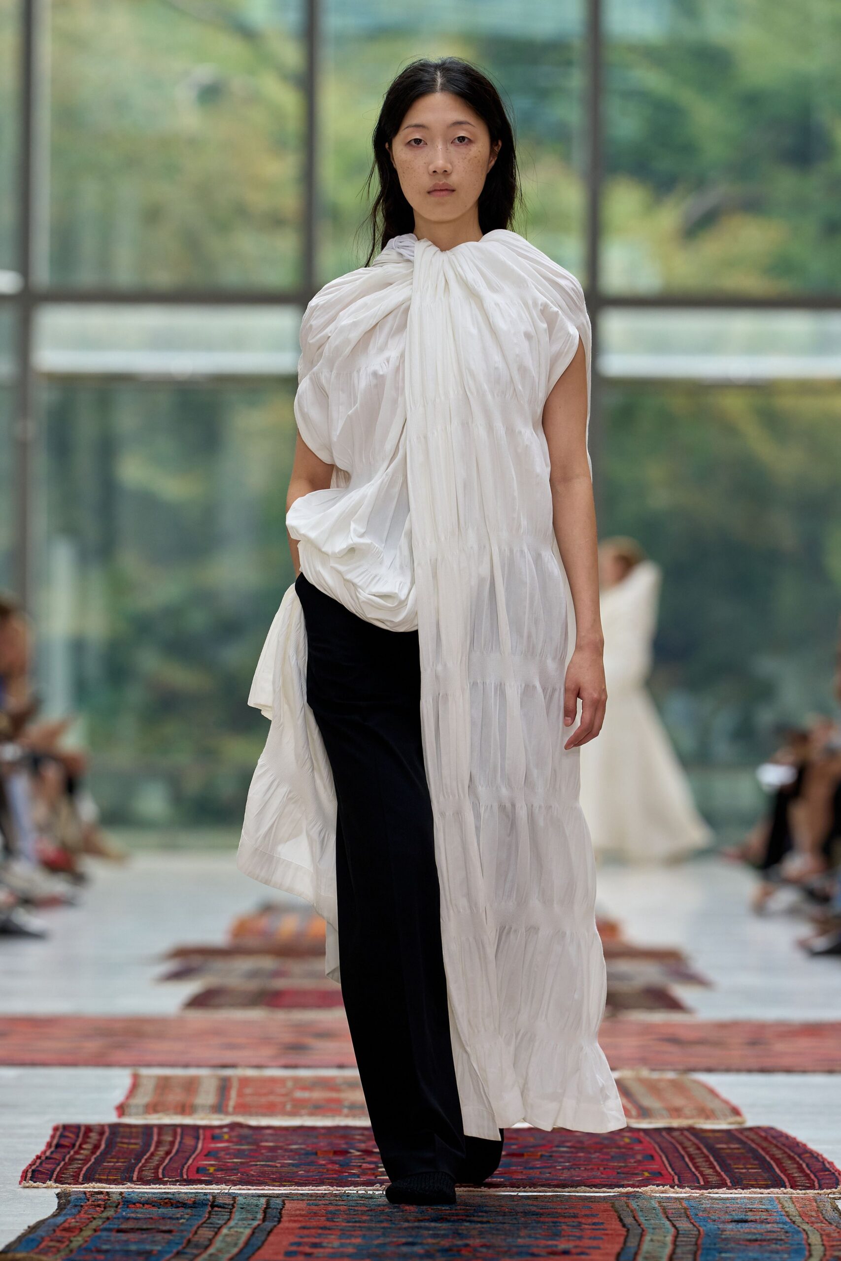 white cotton sleeveless high-neck relaxed pleated flowing dress
