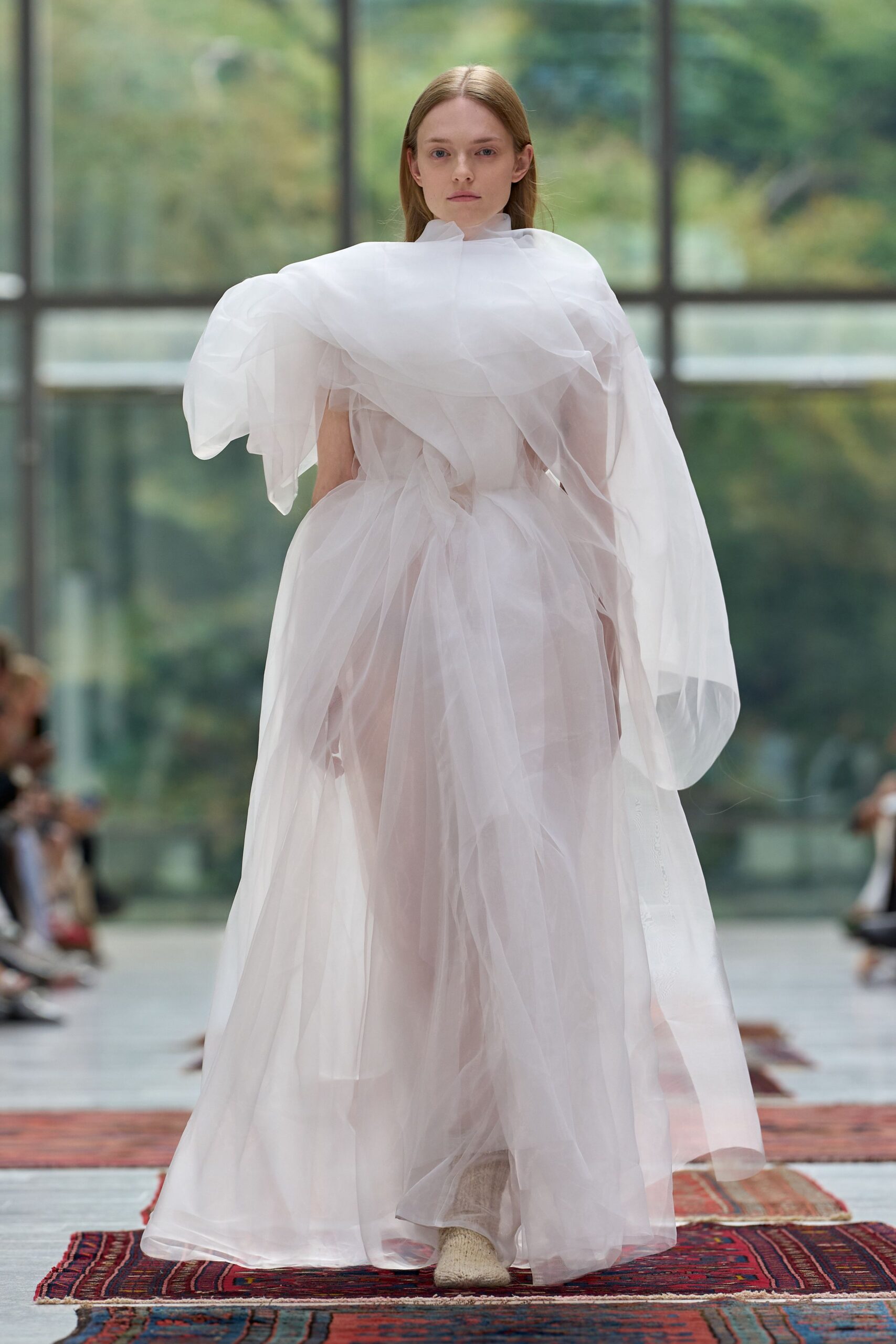 white chiffon sleeveless high-neck relaxed layered flowing gown
