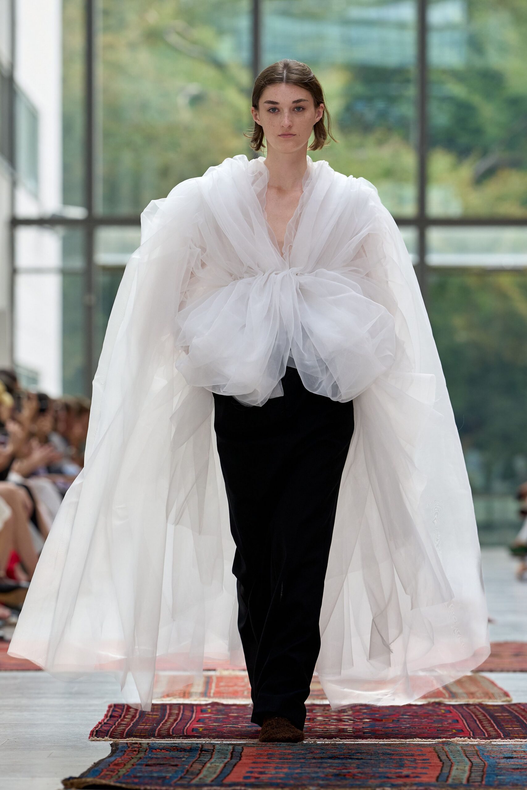 white tulle long-sleeve v-neck relaxed layered draped gown