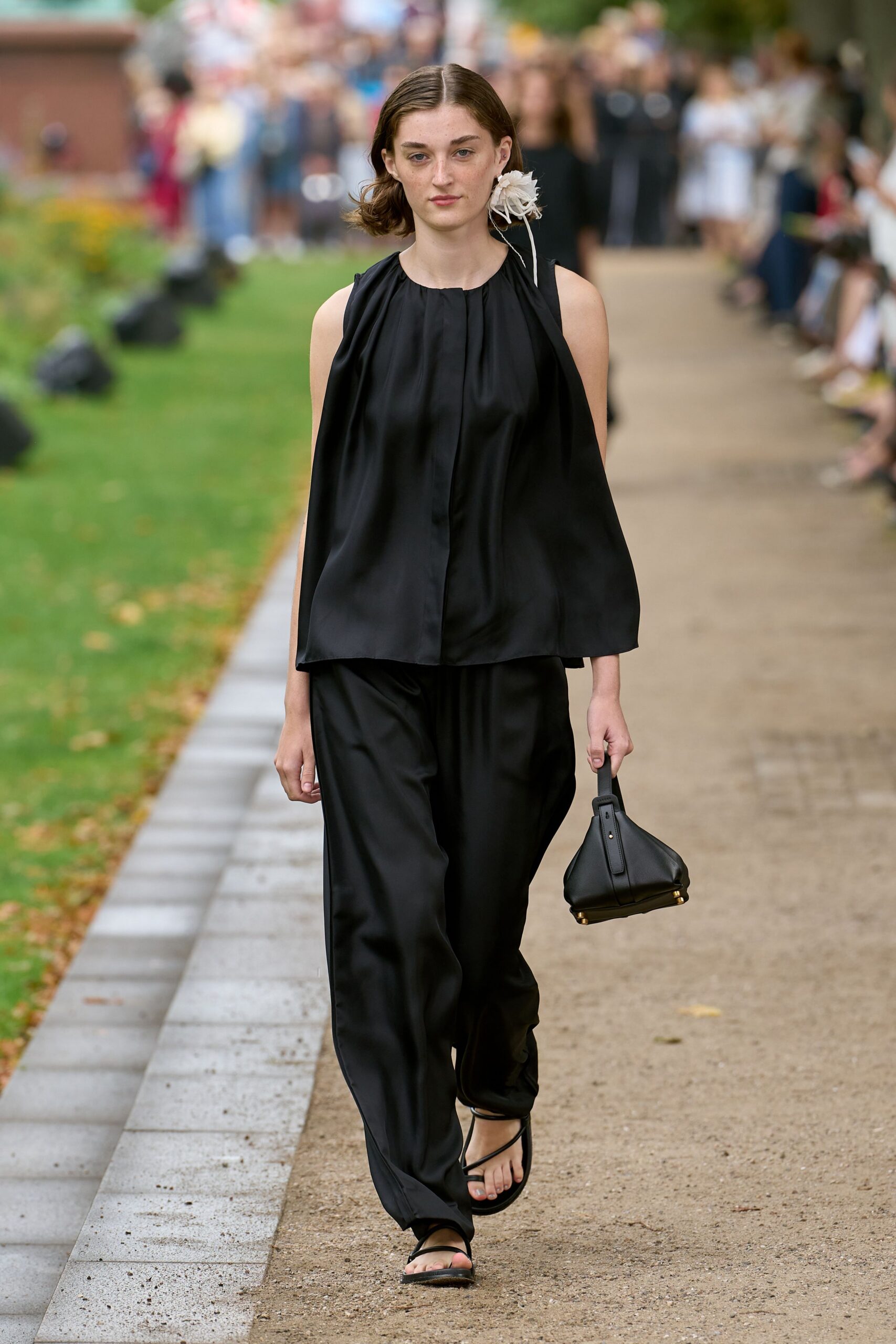 black silk sleeveless high-neck relaxed draped top