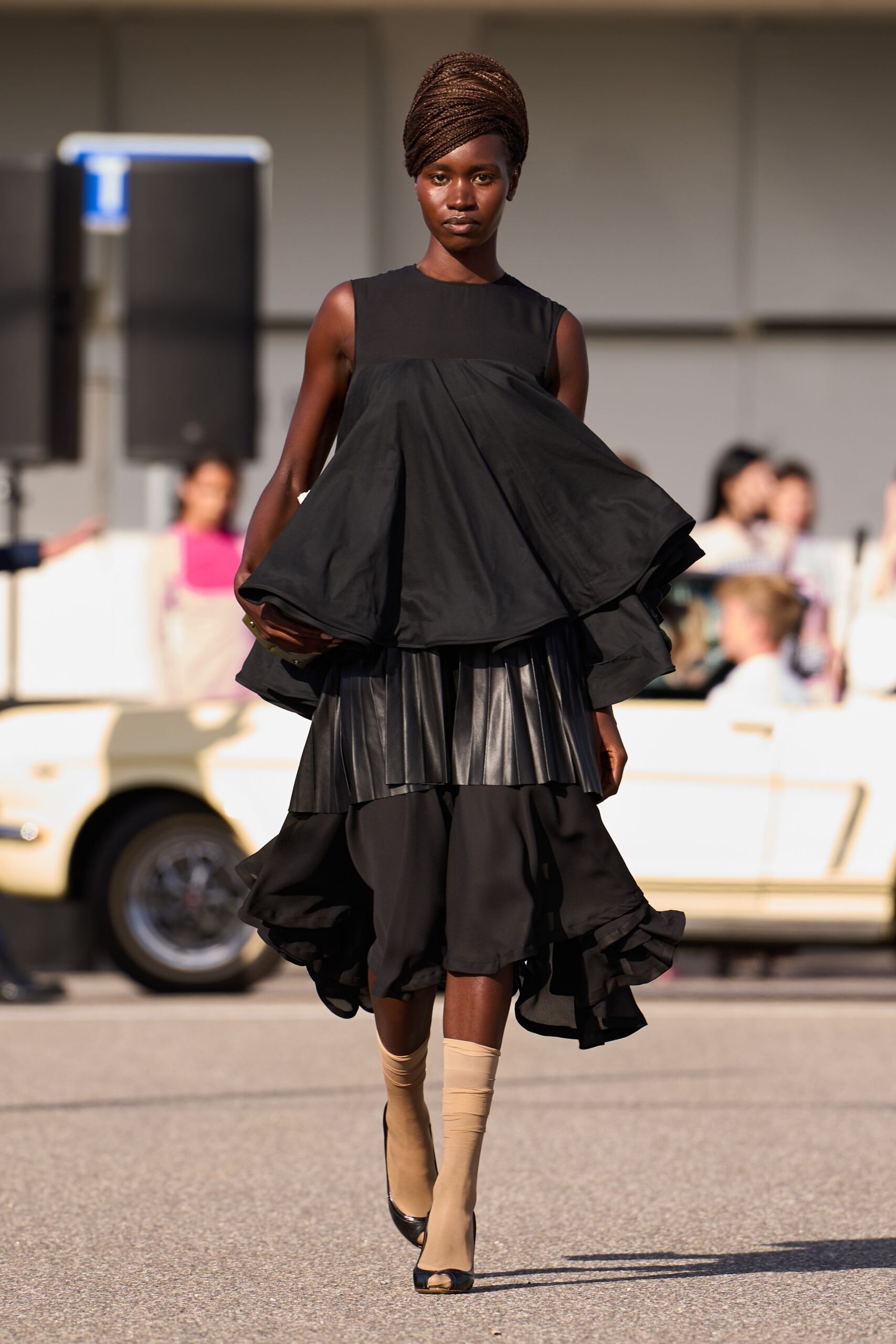 black silk sleeveless high-neck fitted pleated layered dress
