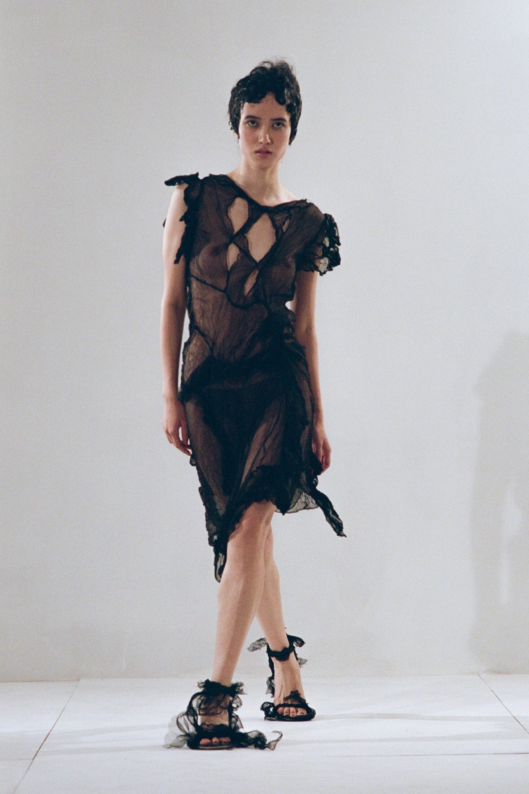 black silk sleeveless v-neck fitted ruffled dress