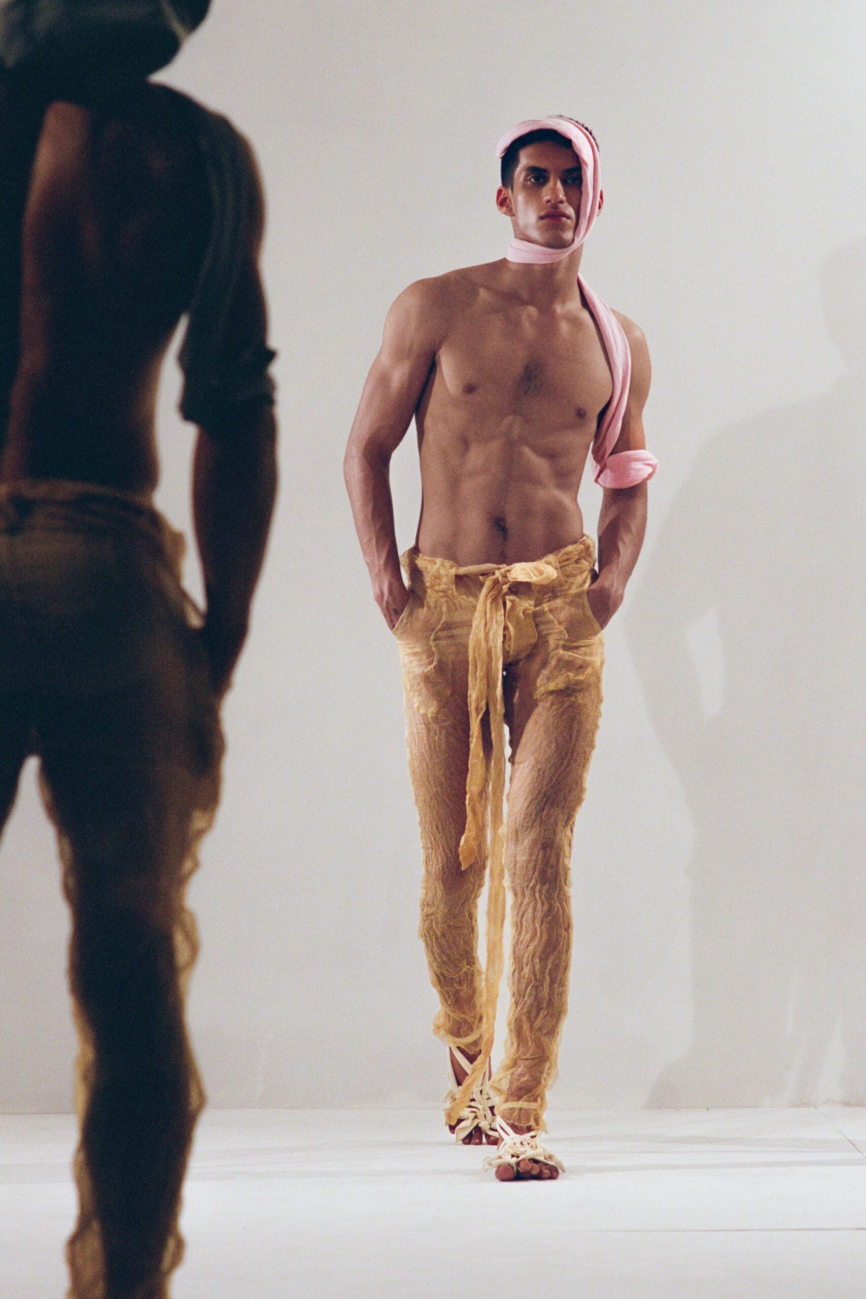 yellow relaxed pants with fringes