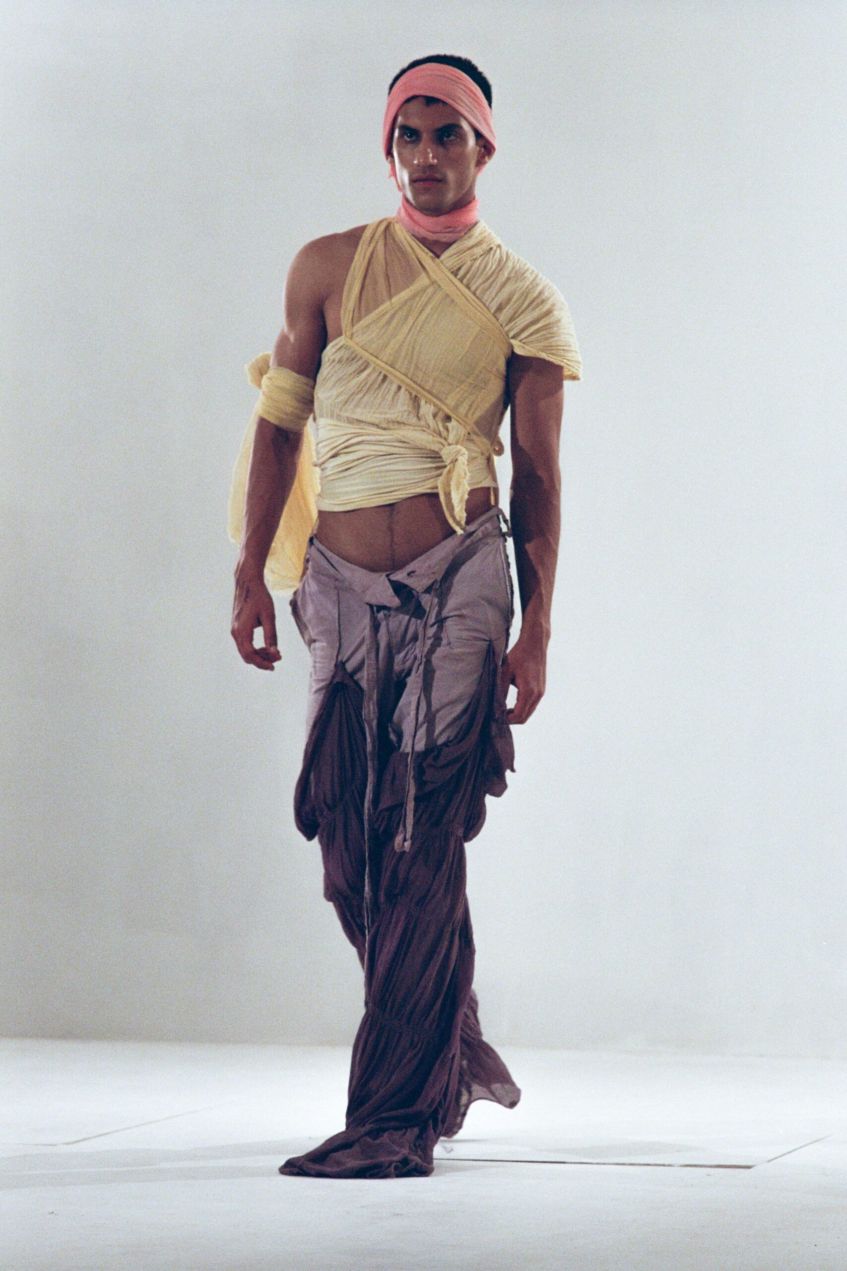 yellow fitted top with draped pants