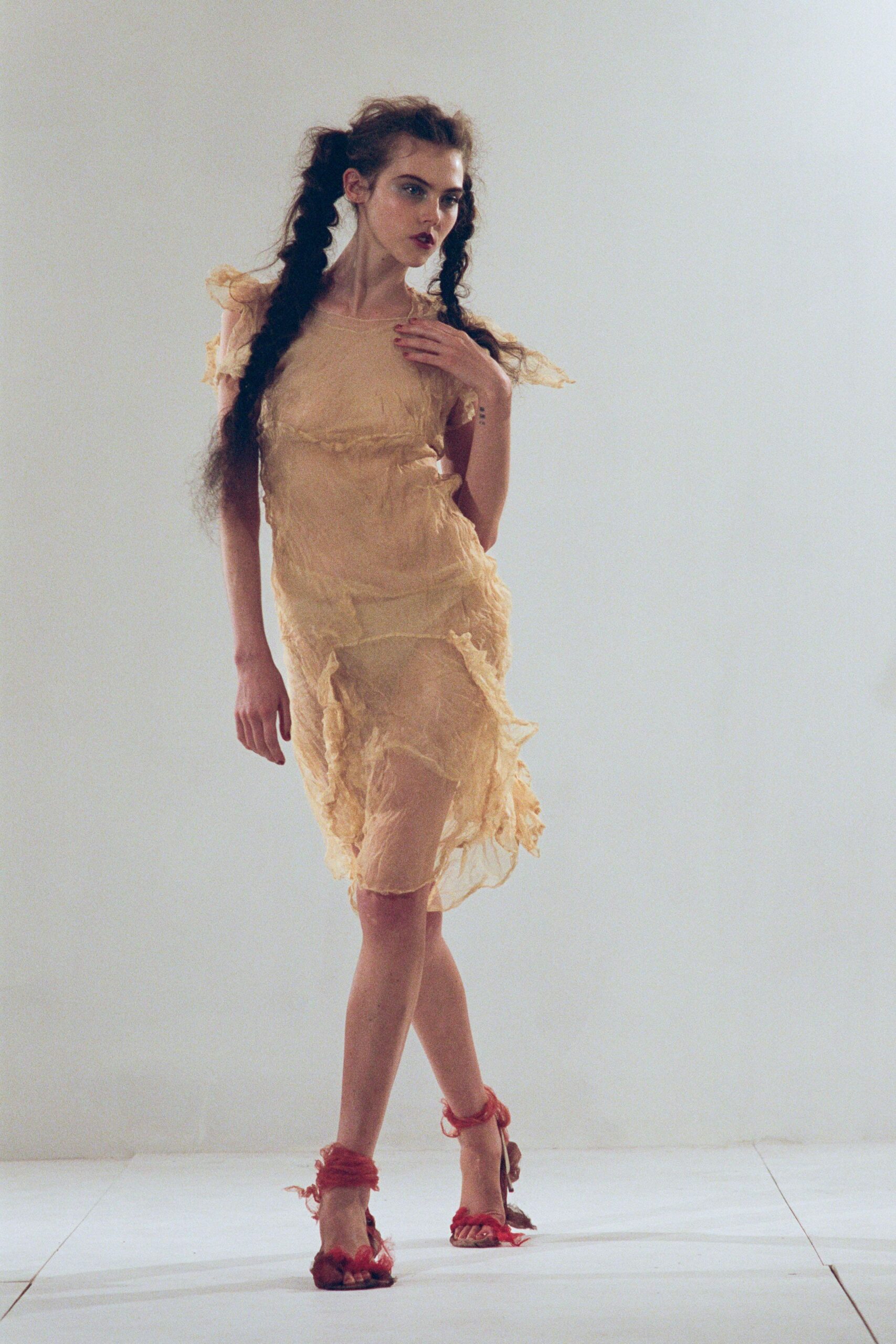 beige silk sleeveless v-neck fitted ruffled layered dress