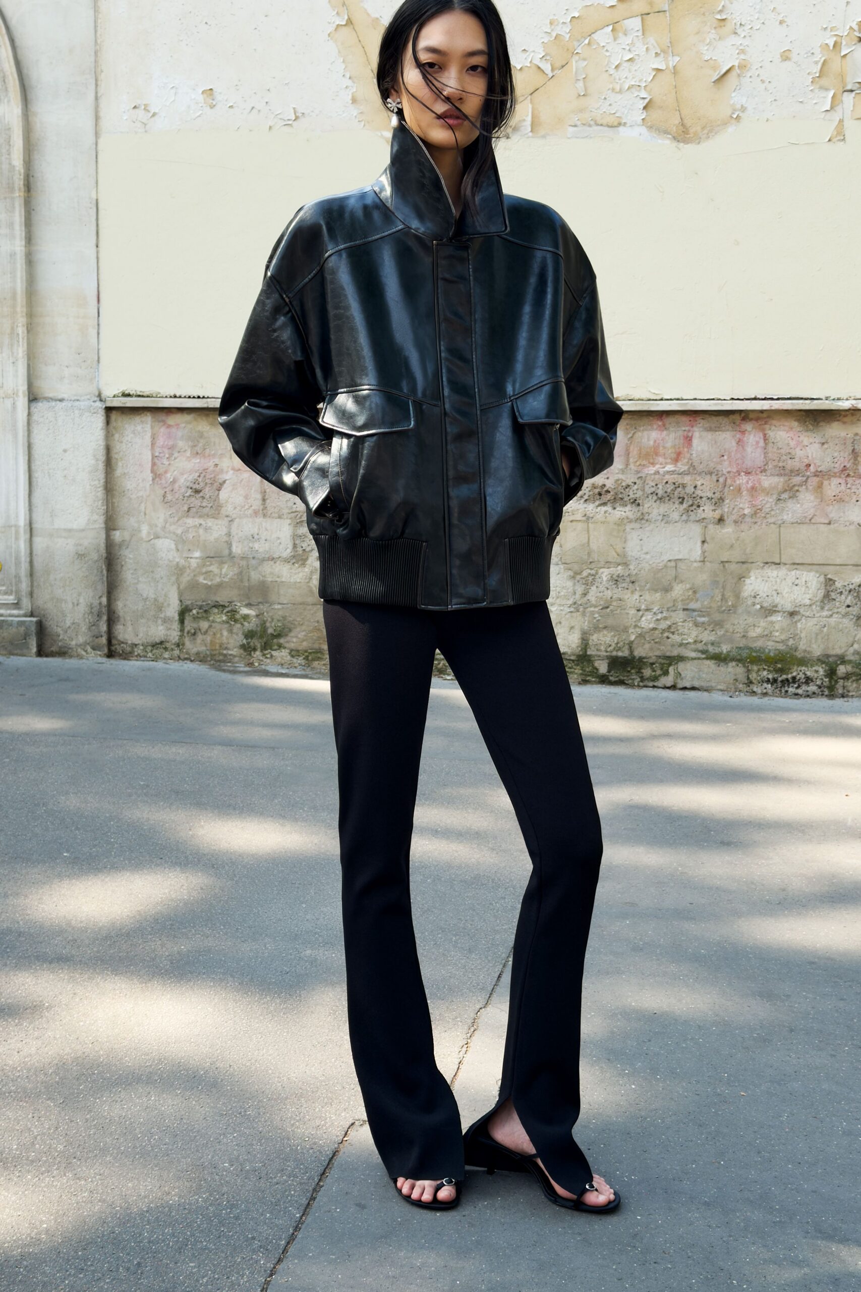 black cotton long-sleeve fitted flared pants