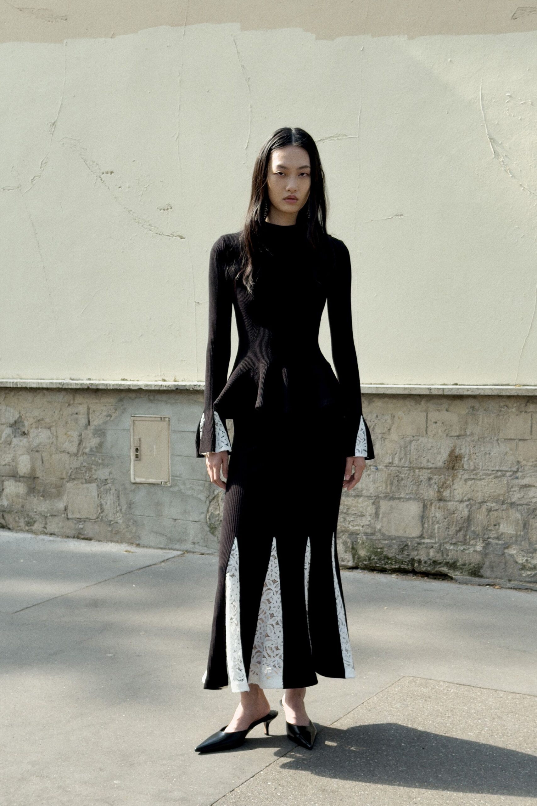 black cotton long-sleeve v-neck fitted pleated midi dress