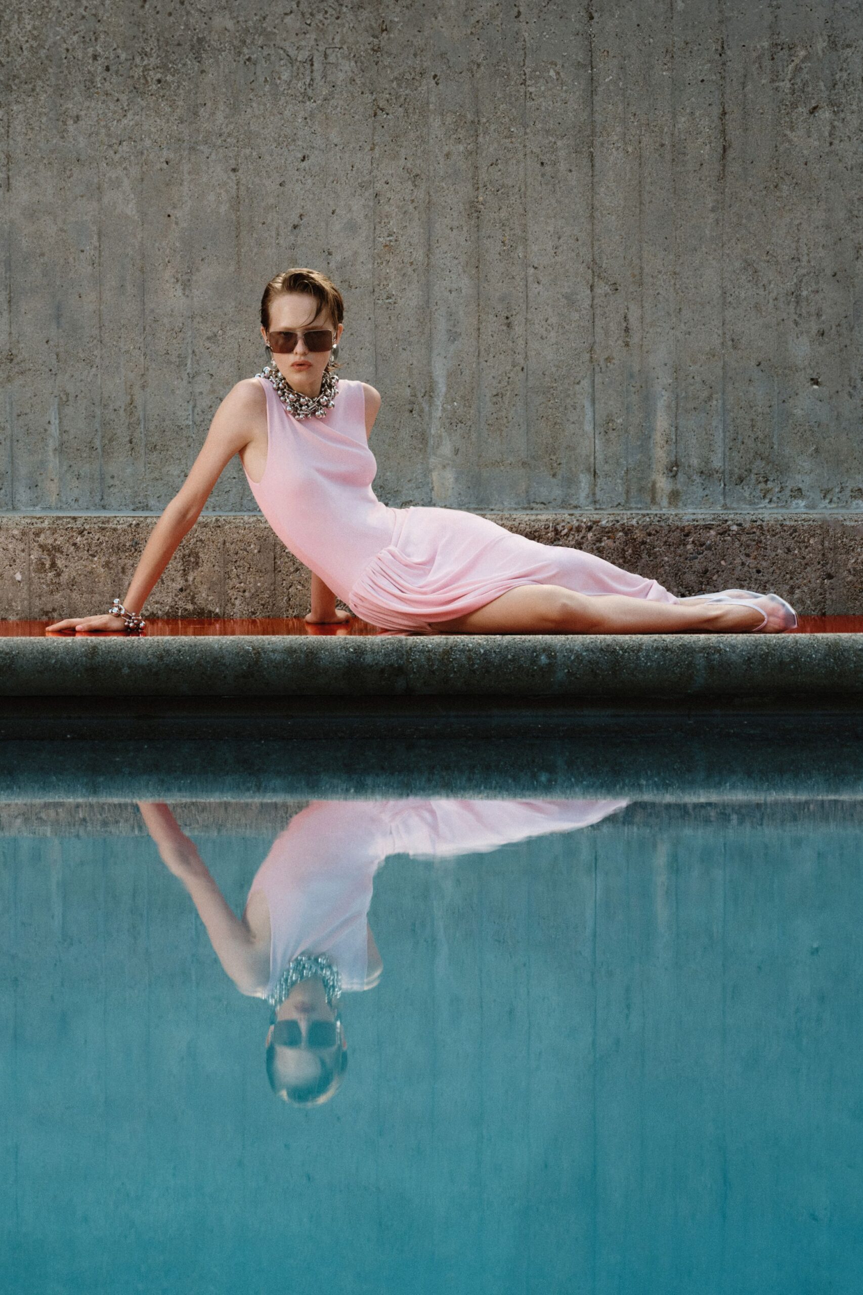 pink silk sleeveless v-neck fitted draped flowing gown