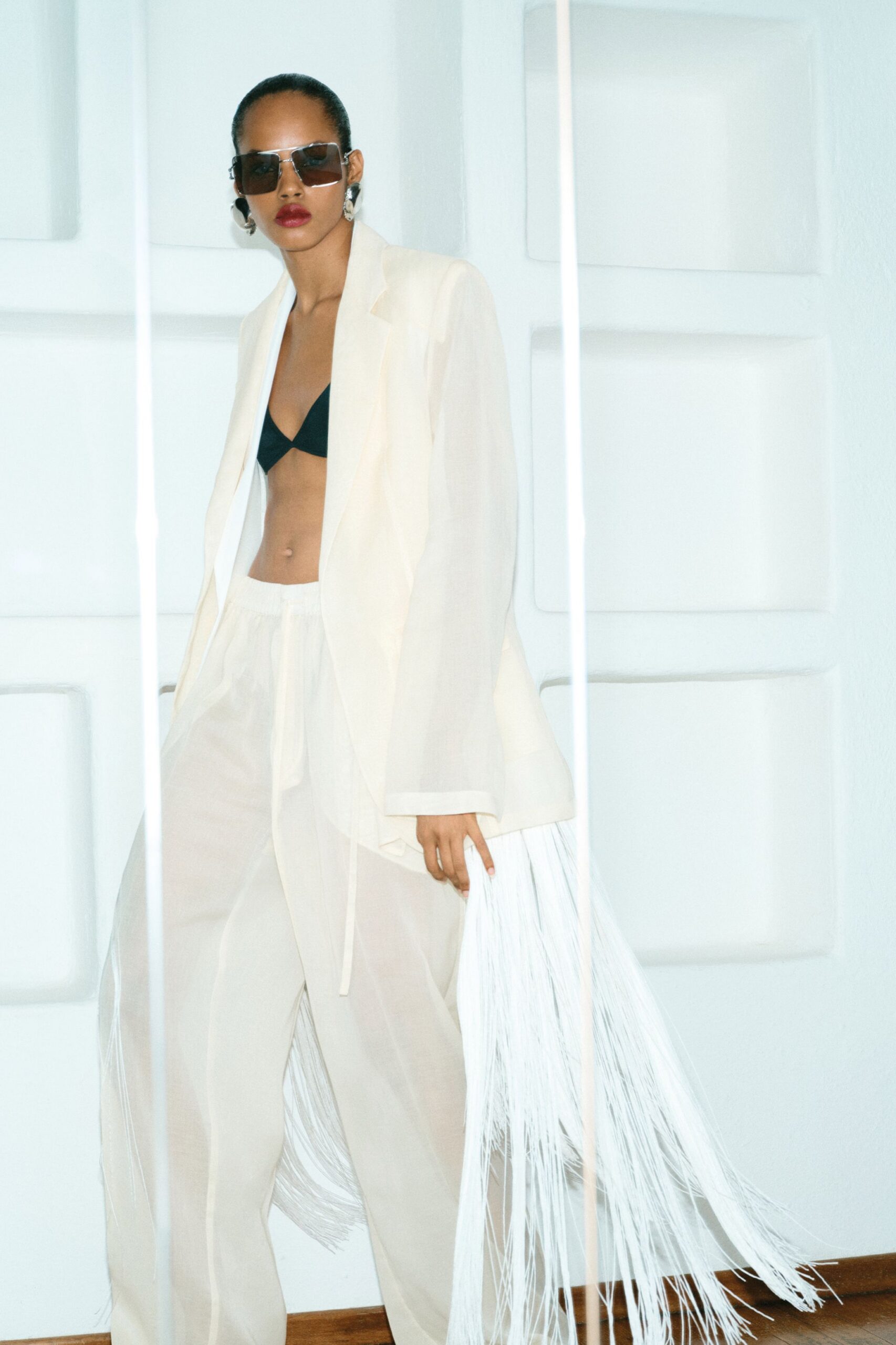 white cotton long-sleeve collared relaxed fringed blazer