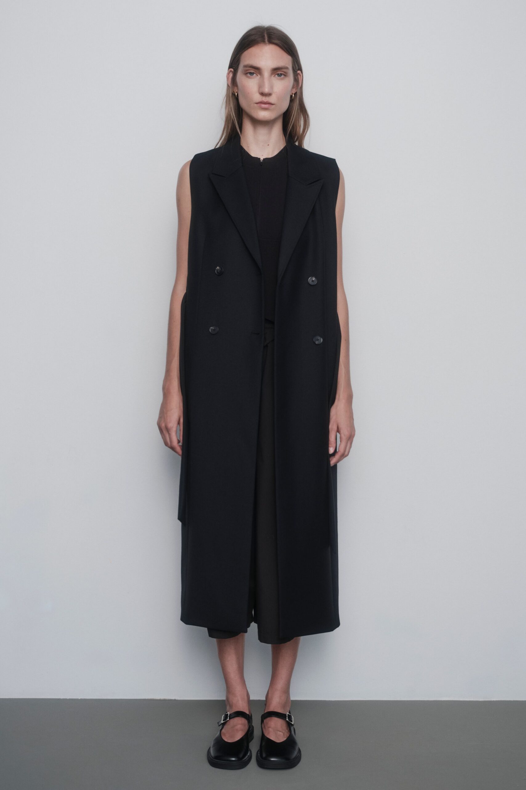 black wool long-sleeve collared fitted vest