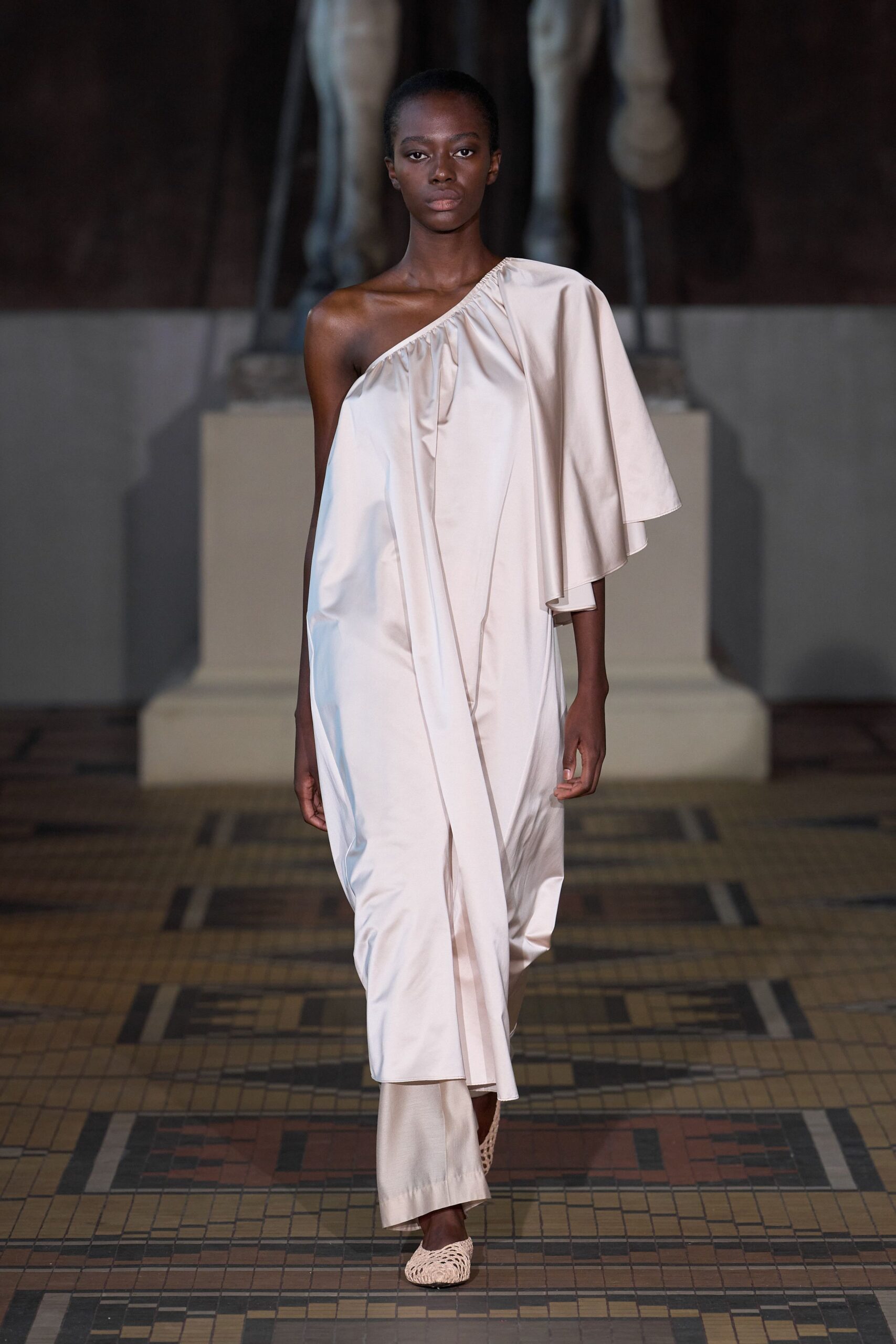 ivory silk sleeveless asymmetric relaxed draped flowing gown