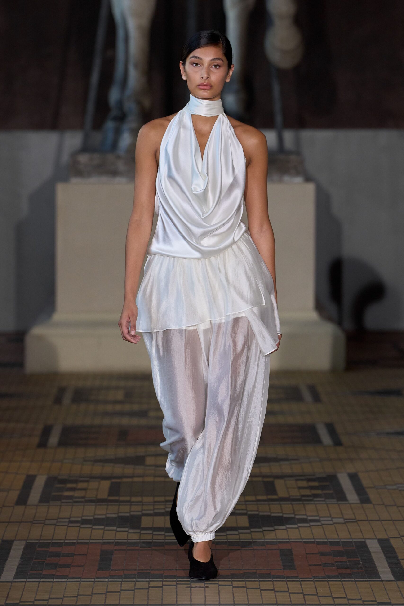 white silk sleeveless high-neck relaxed draped flowing top
