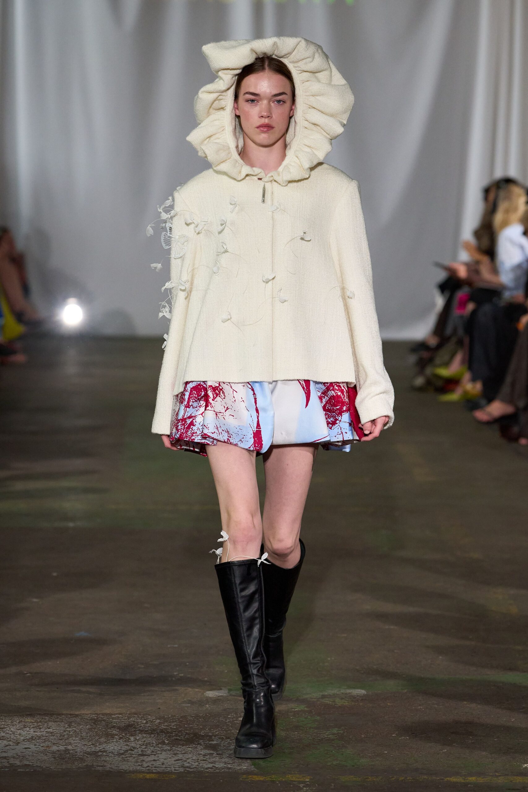 white cotton long-sleeve collared relaxed ruffled cape