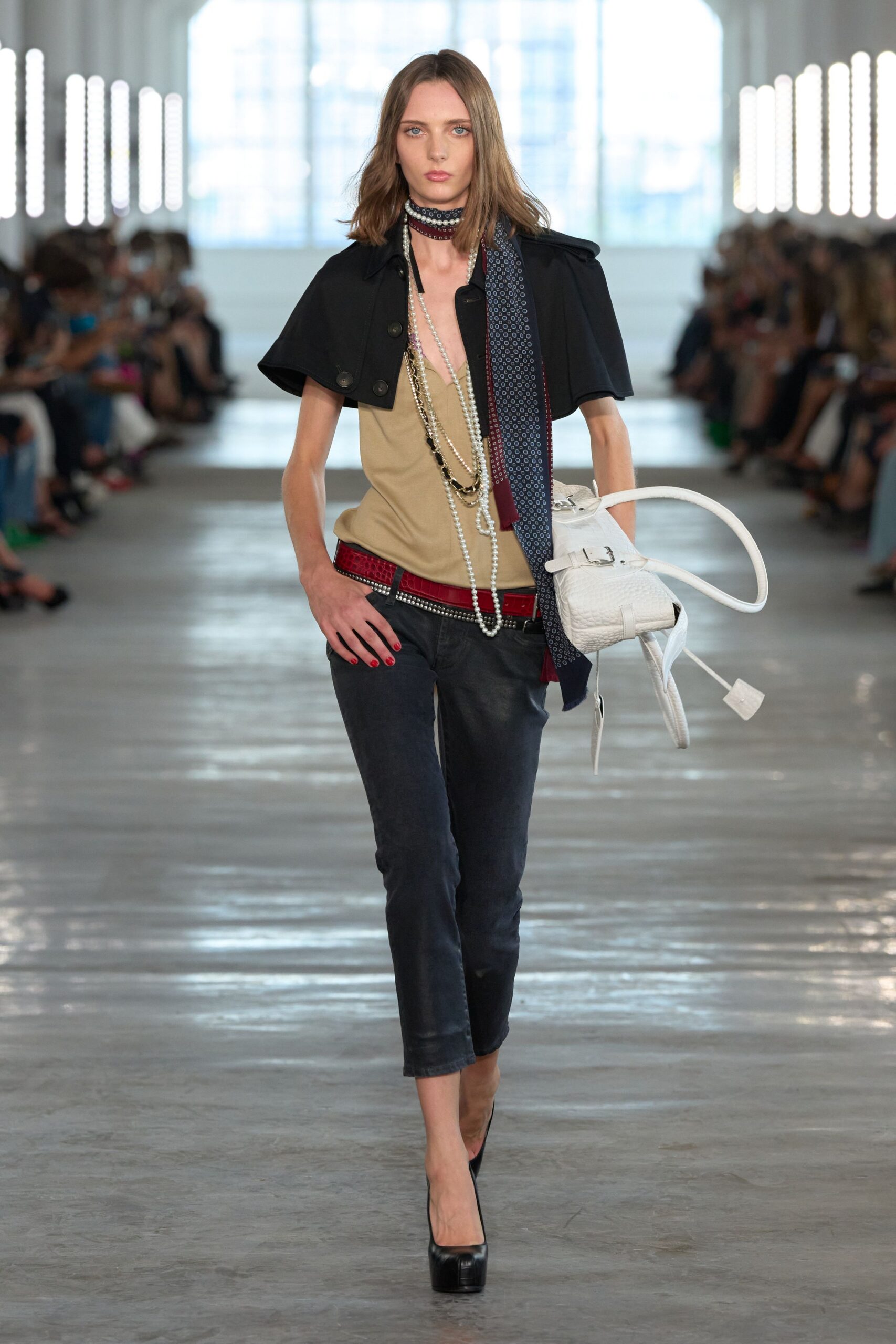 black capelet over beige camisole