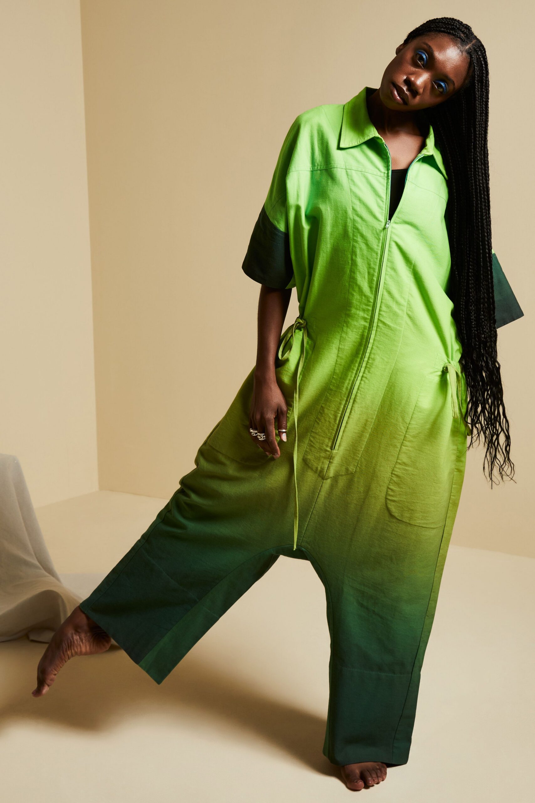 green drop-crotch zip-front jumpsuit