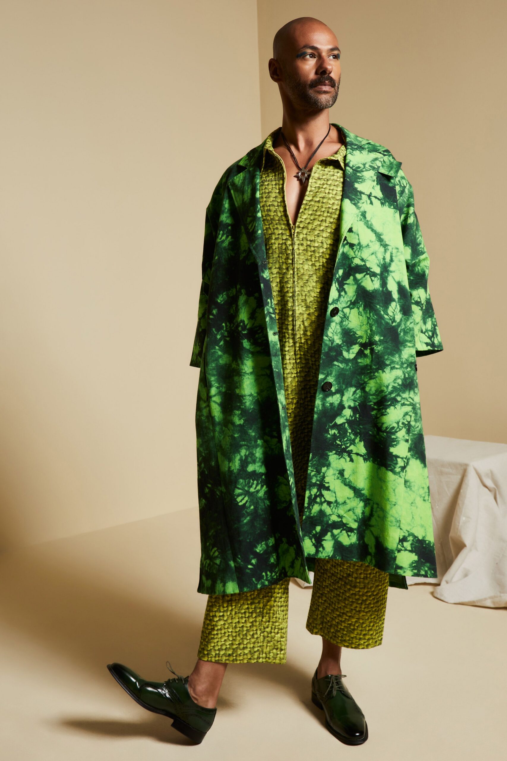 green tie-dye overcoat