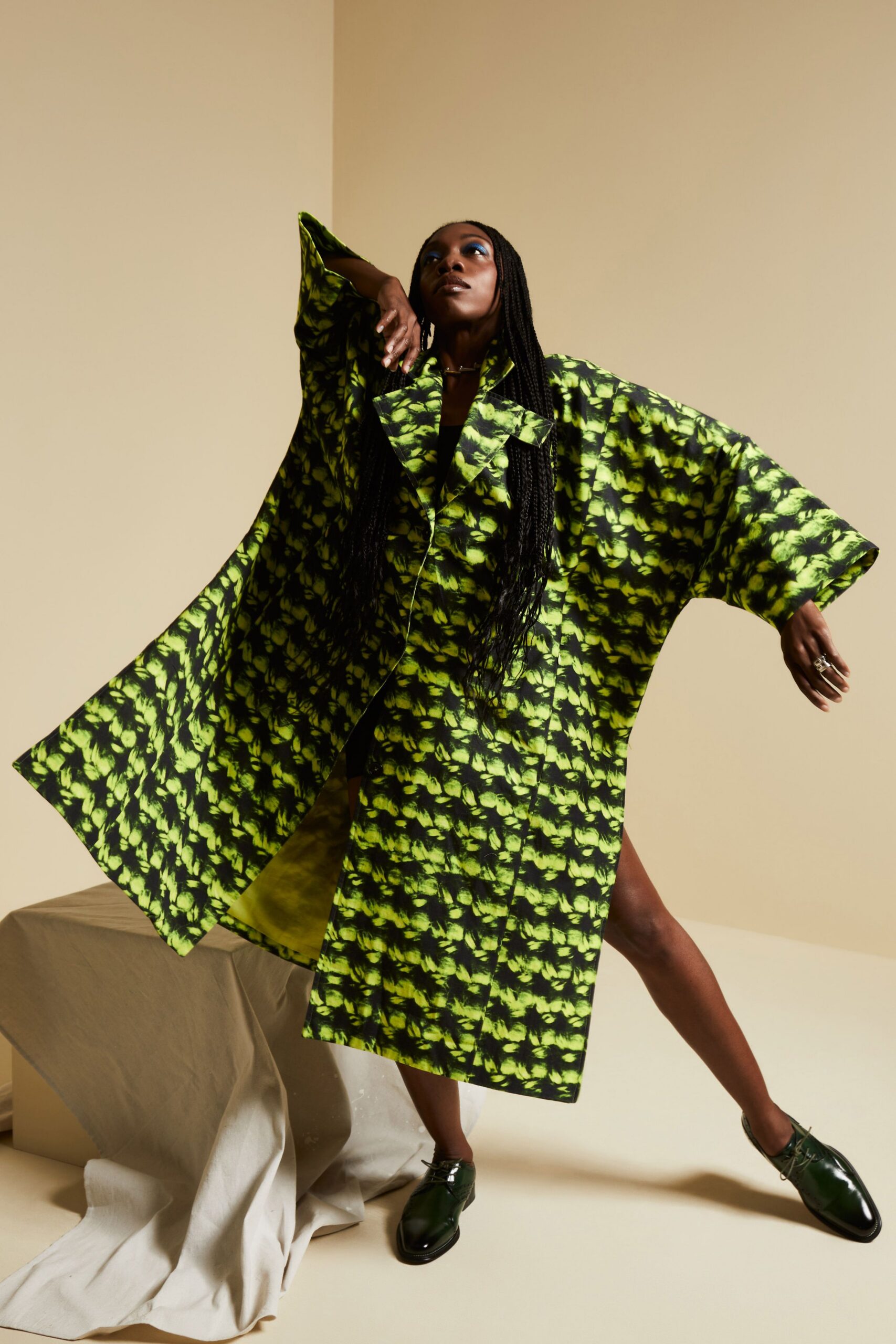 green and black kimono-style coat