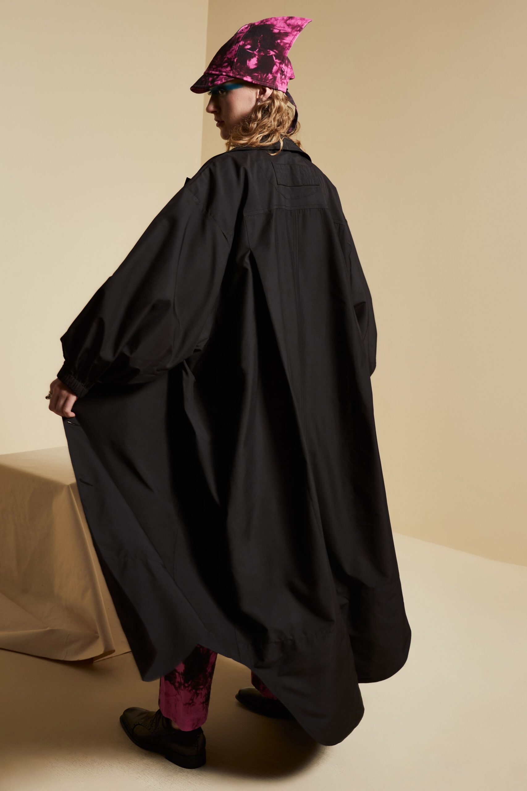 oversized black cape-like coat
