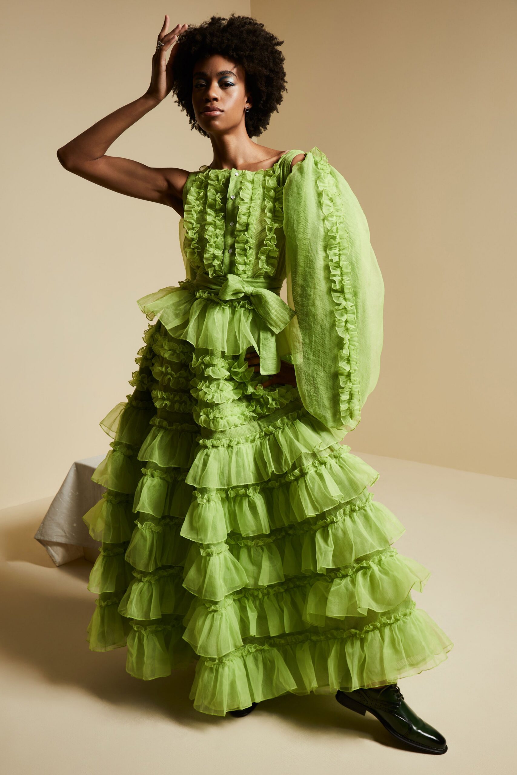 lime green ruffled one-sleeve gown