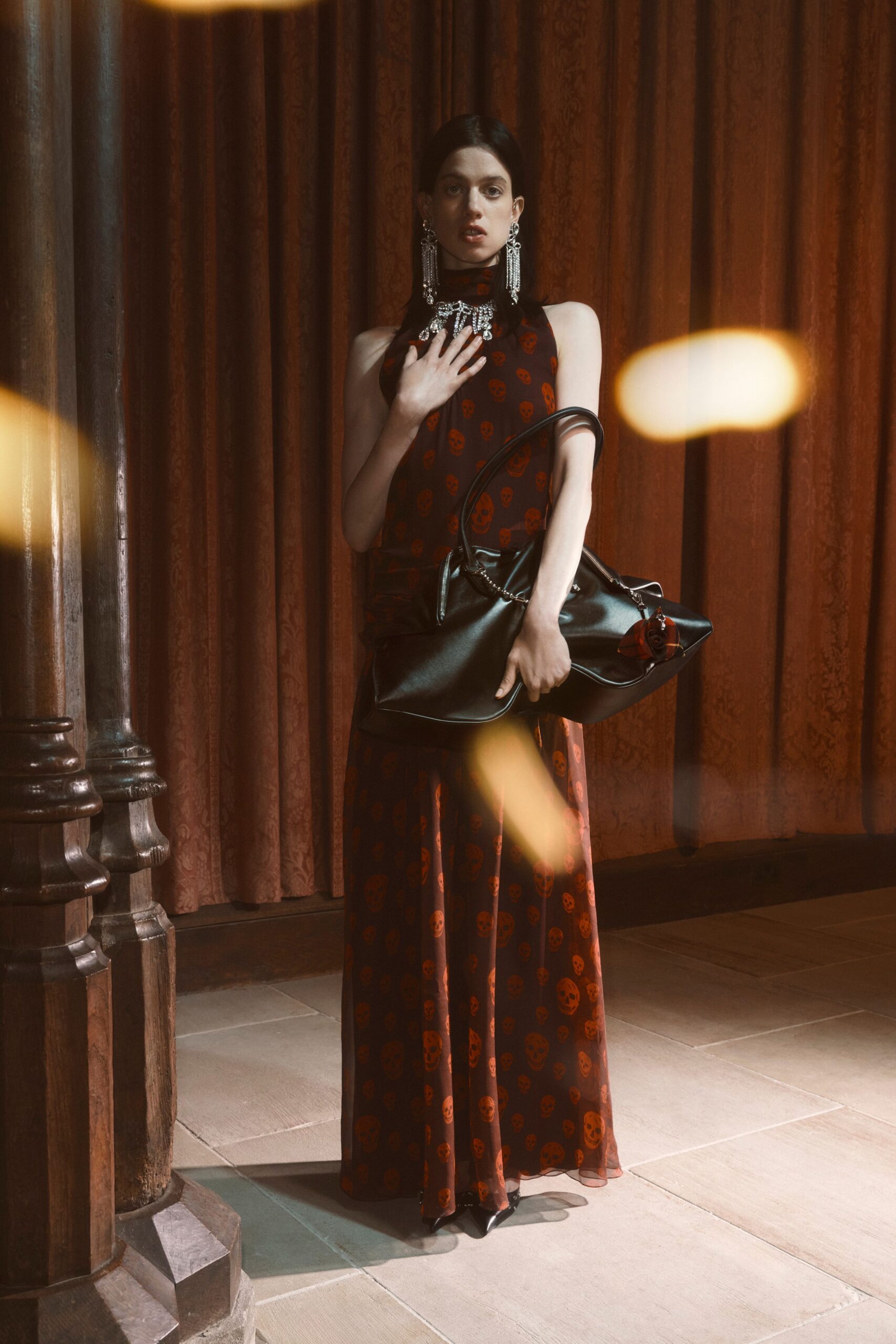 black chiffon sleeveless high-neck printed sheer flowing maxi-dress
