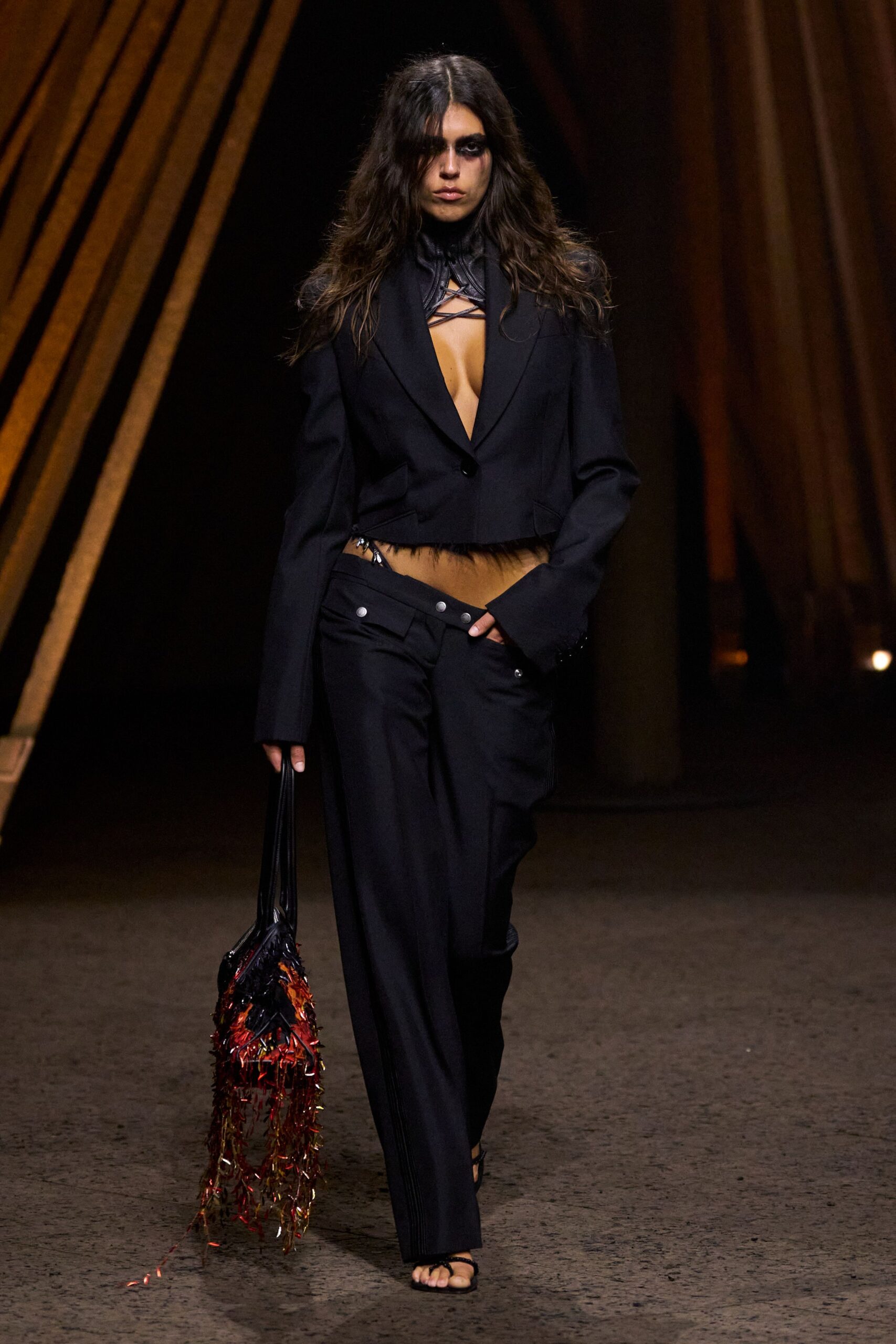 black leather high-neck sleeveless knotted shiny top