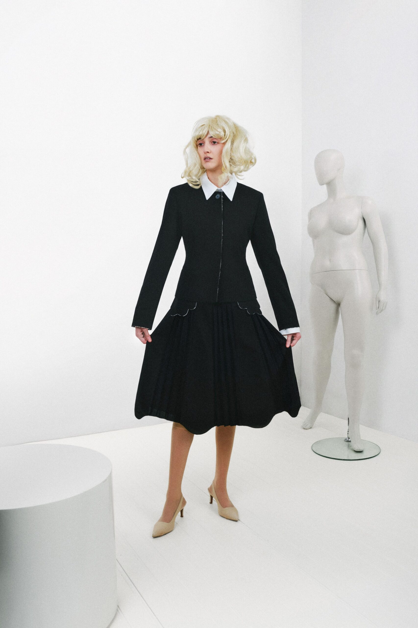 black drop-waist pleated midi dress