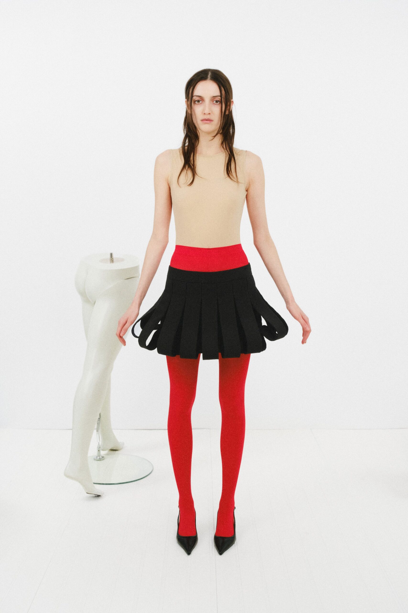 sculptural pleated mini skirt