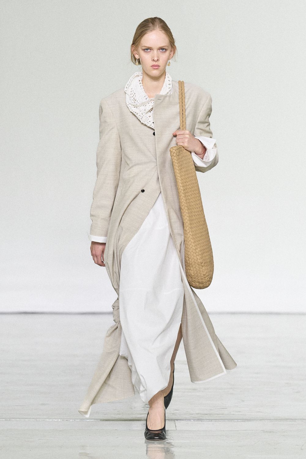 beige maxi coat over white dress