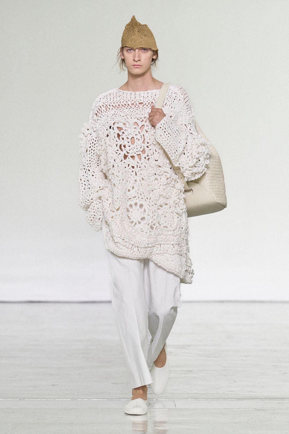 oversized hand-crocheted openwork sweater